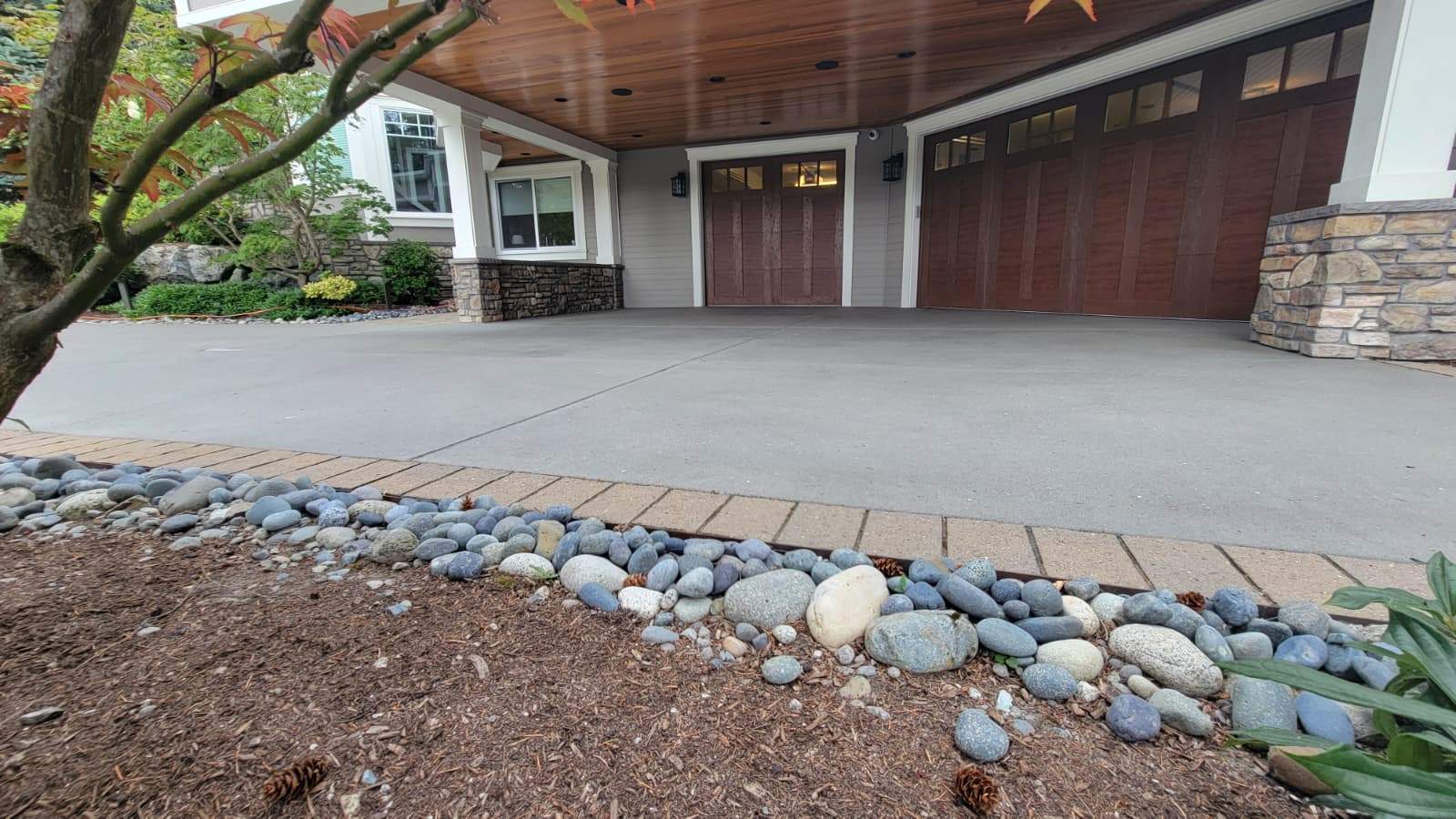 Coastal Grandeur Driveway and Patio in Big Sur Vuba Stone by Concrete Coating Experts Inc.
