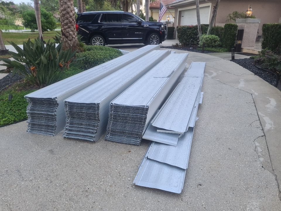 Residential Roofing Installation using 1" Nail strip metal roof by BLUES BROTHERS ROOFING