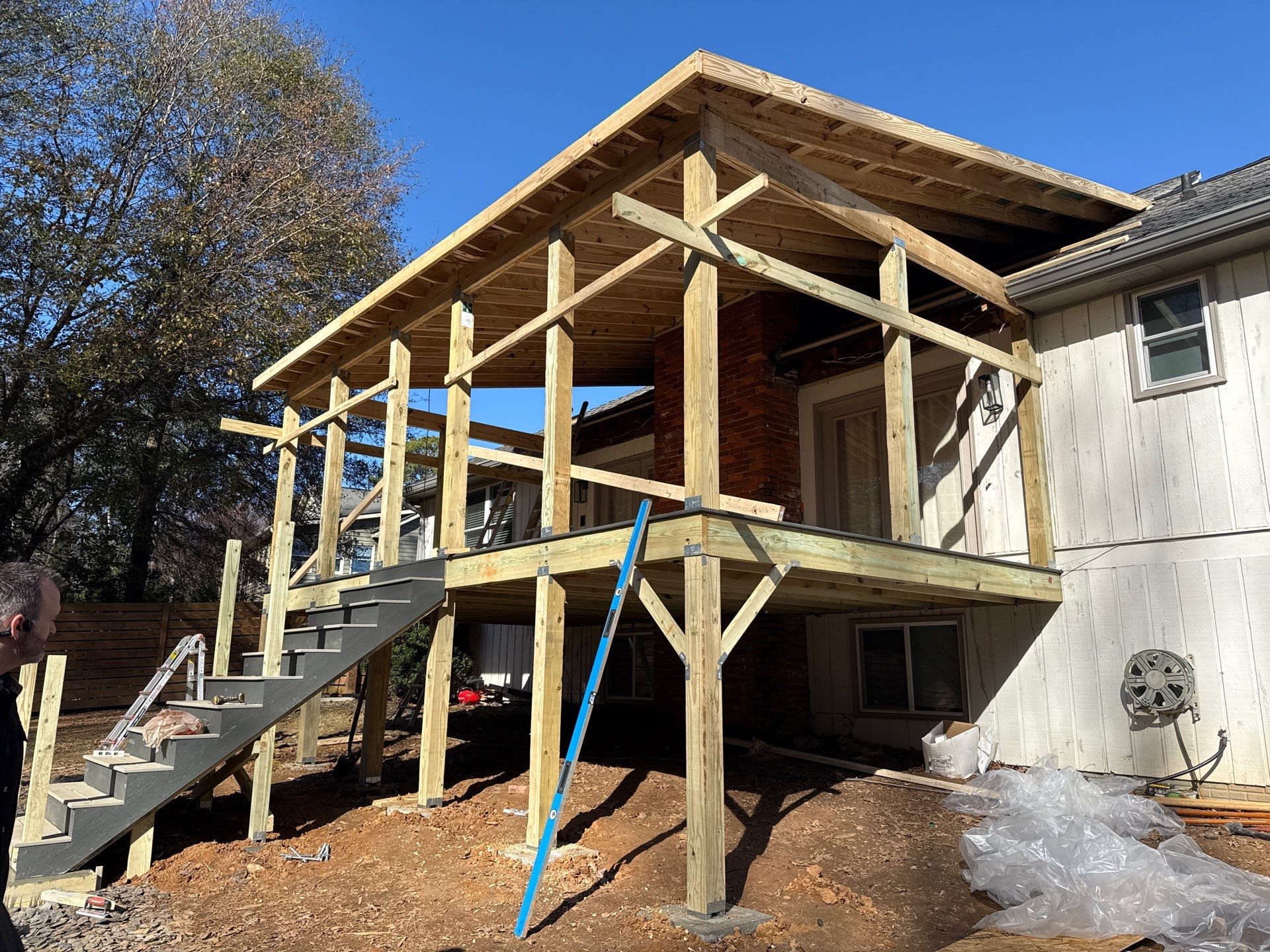 Deck and Shed Roof Style Covered Build using Trex Decking Products by Nelson Exteriors 