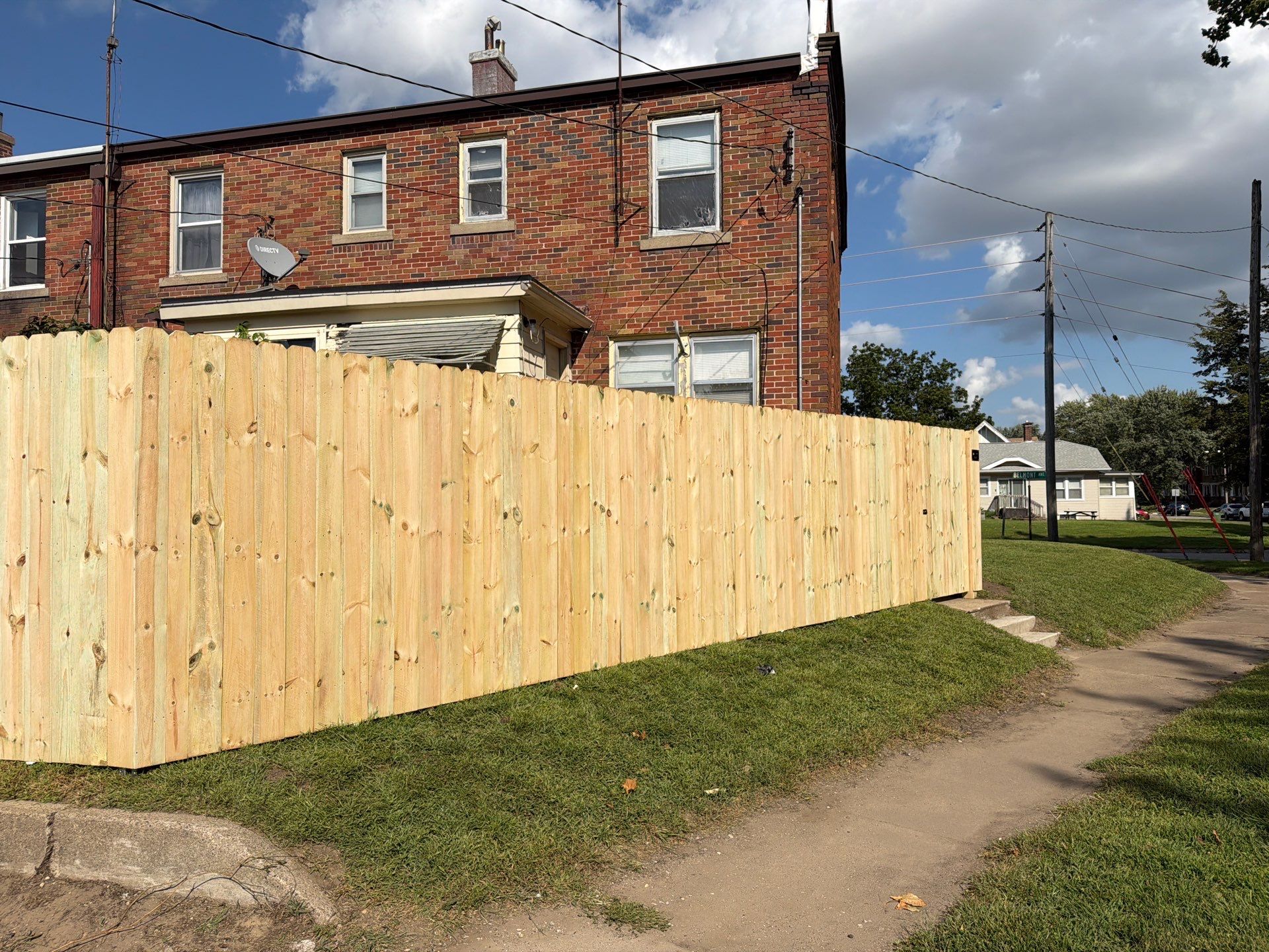 New Treated Wood Privacy Fence and Metal-Framed Gates by Perfect Picket Fence and Stain