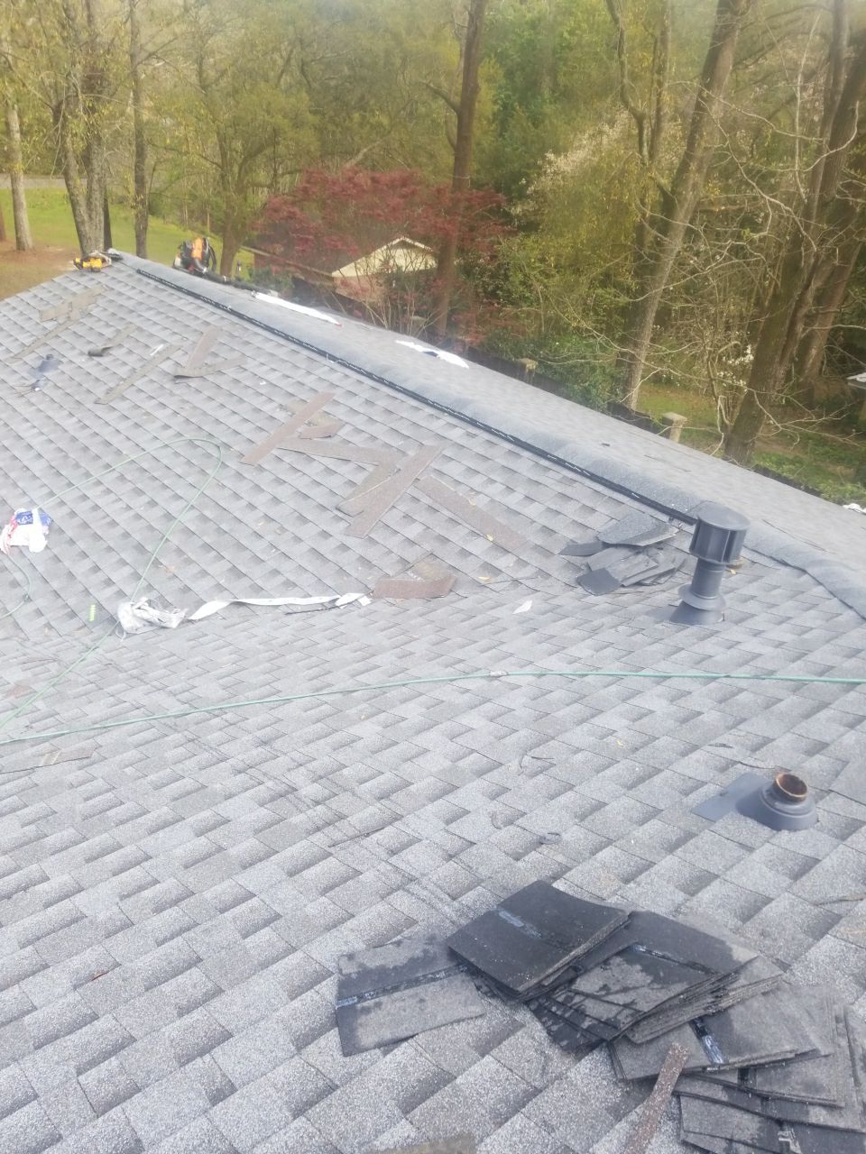 Residential Roofing Installation using Roof Replacement by American Roofing & Construction LLC