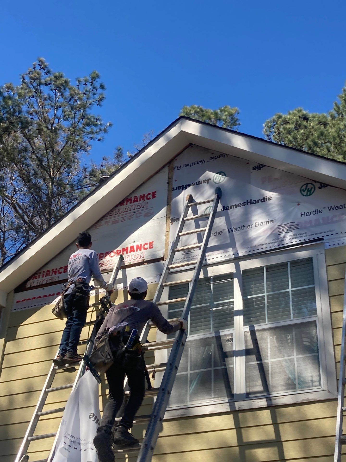 Green Exterior Paint and James Hardie Siding Transformation in Smyrna, GA by Nelson Exteriors 