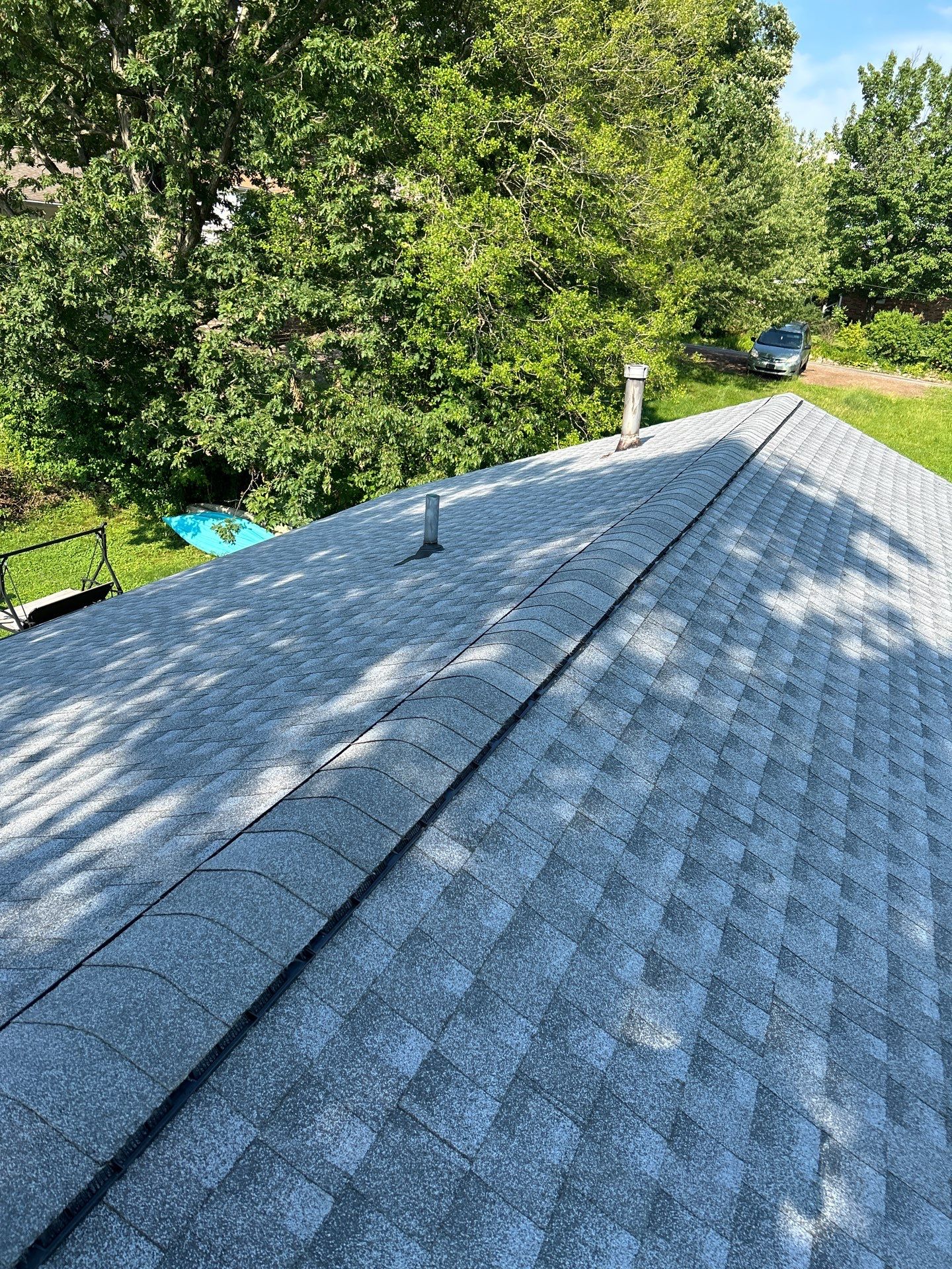 Residential Roofing Installation using GAF Timberline HDZ Oyster Grey by Rainstoppers Roofing