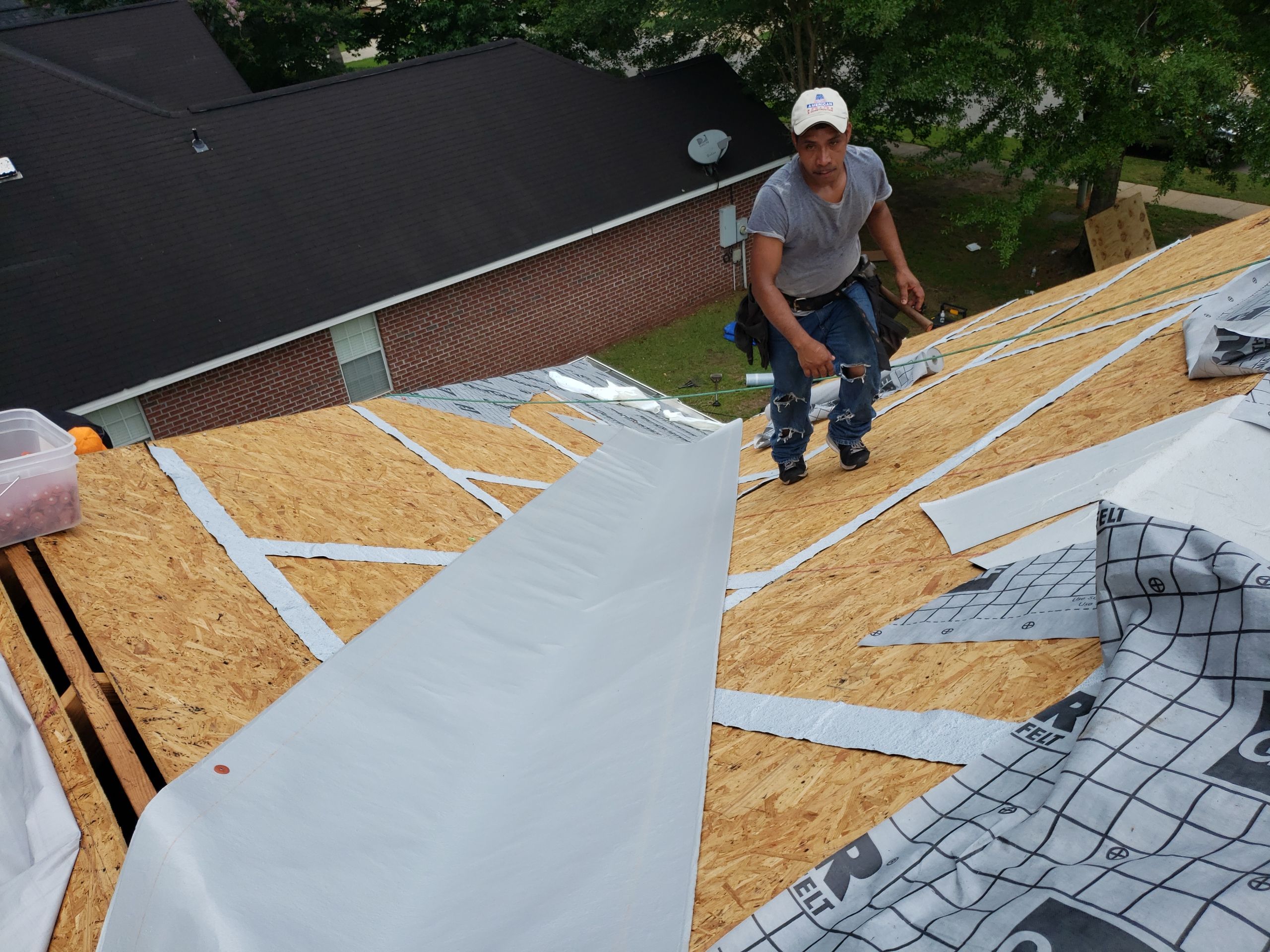 Residential Roofing Installation using Roof Replacement by American Roofing & Construction LLC