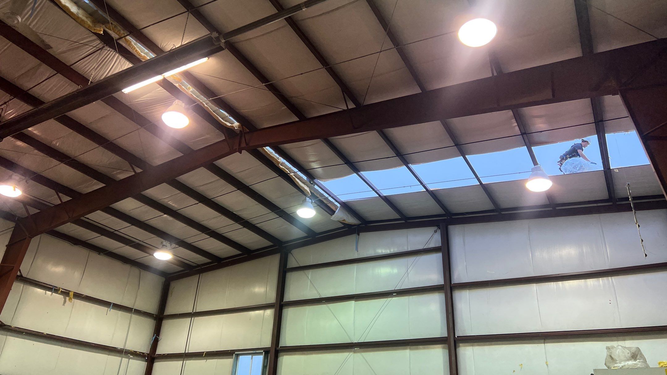 Airport Hanger Metal Roof Replacement and Insulation by Villegas Remodeling, LLC