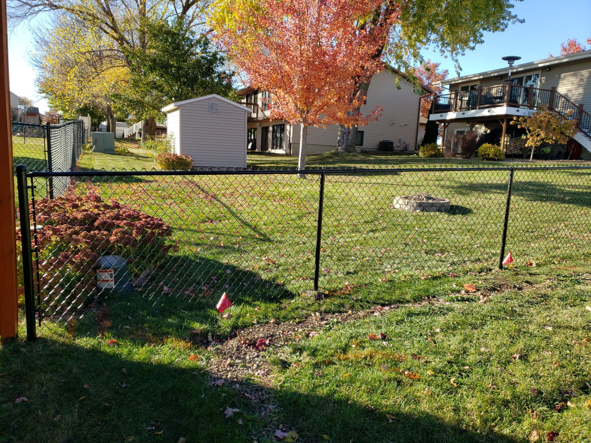 Black Chain Link Fence and Gate Installation in Cedar Falls by Perfect Picket Fence and Stain