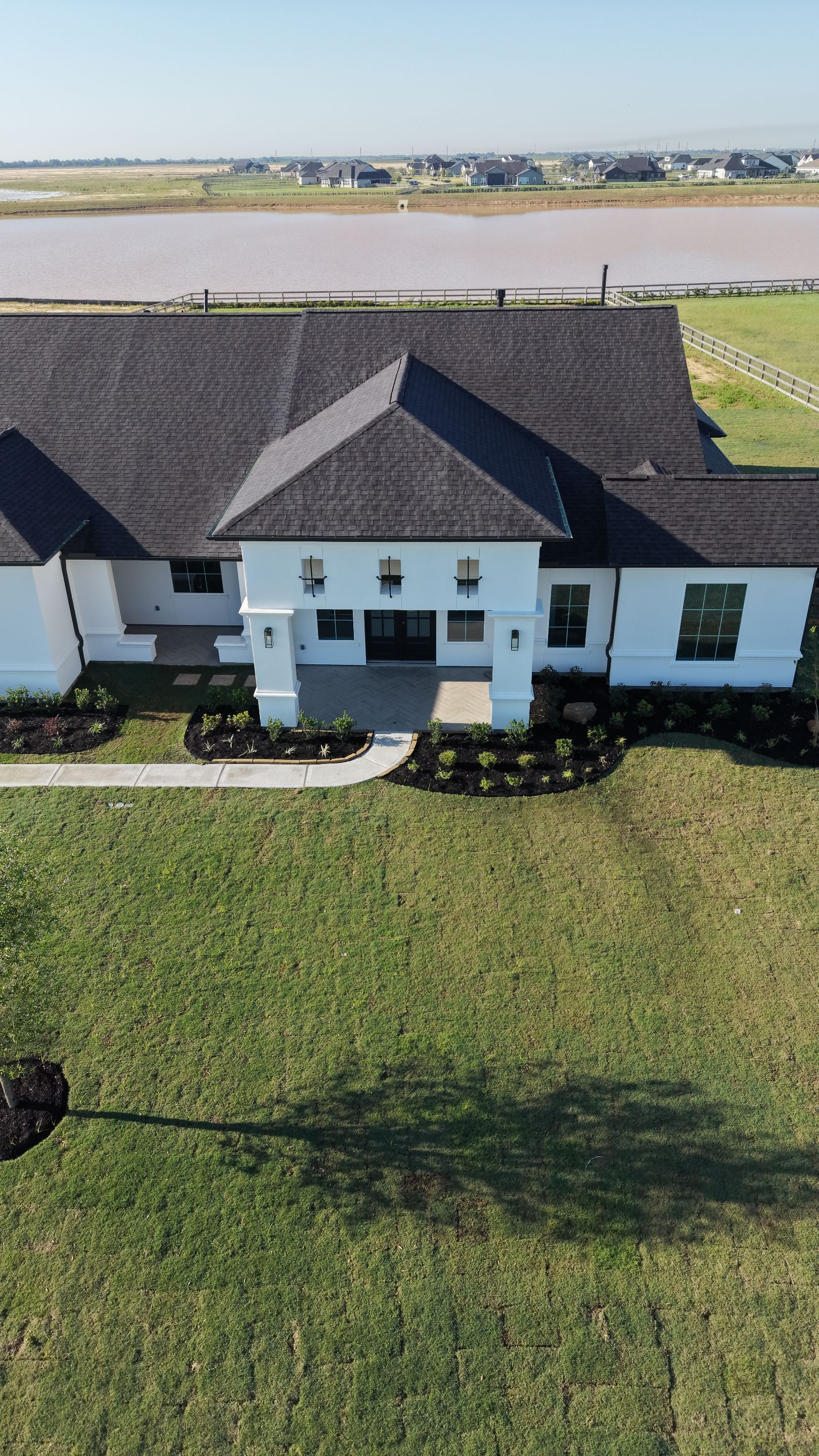 Custom Stucco Masterpiece with Precision Foam Detailing – Waller, TX by Apex Conventional Stucco Llc