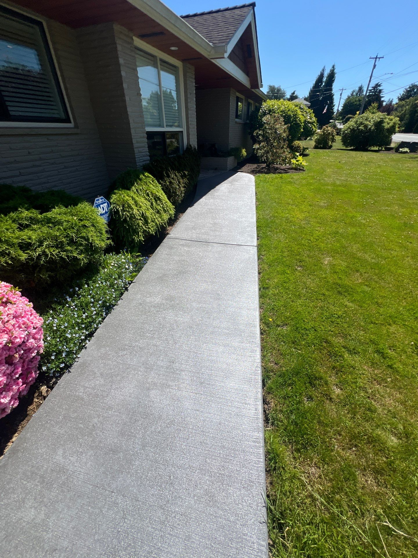 Colored Concrete Driveway Repair with Sealer| Everett    by Jireh Asphalt & Concrete Inc 