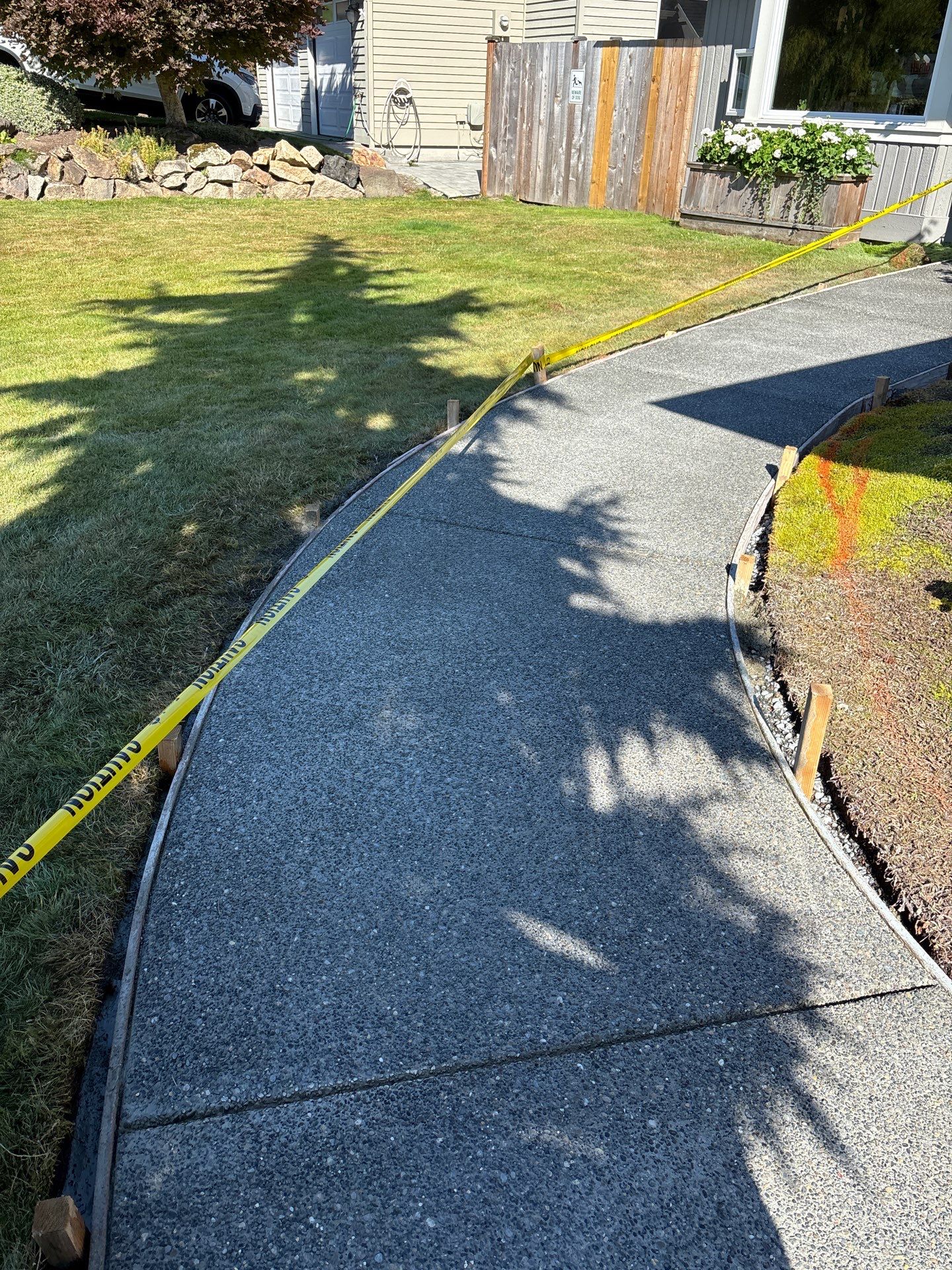 Exposed Aggregate Concrete Driveway Makeover  by Jireh Asphalt & Concrete Inc 