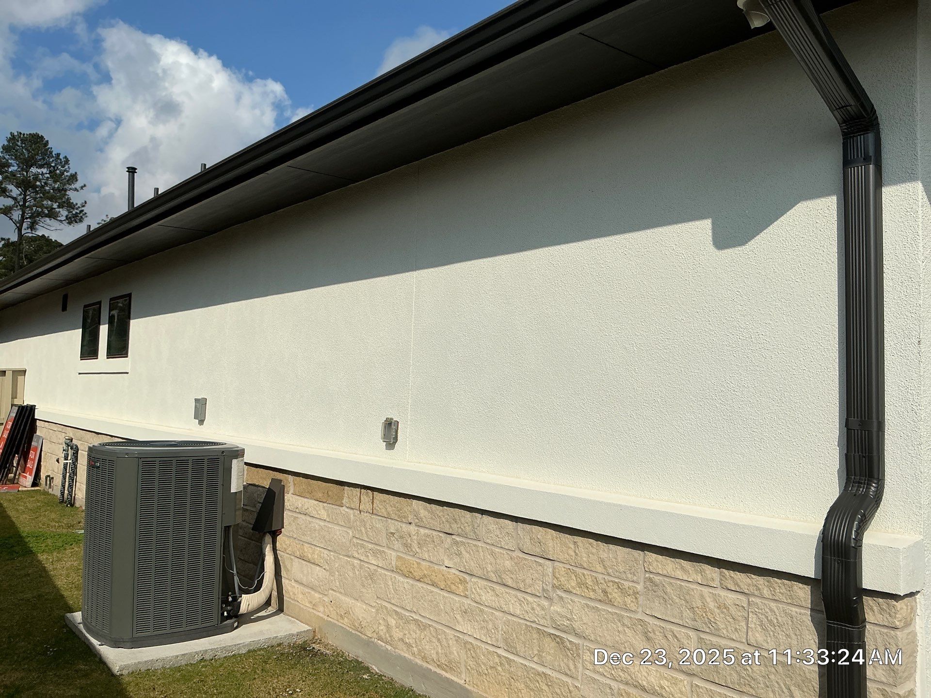 Magnolia Contrast: Light Stucco with Dark Accents and Stone Details by Apex Conventional Stucco Llc
