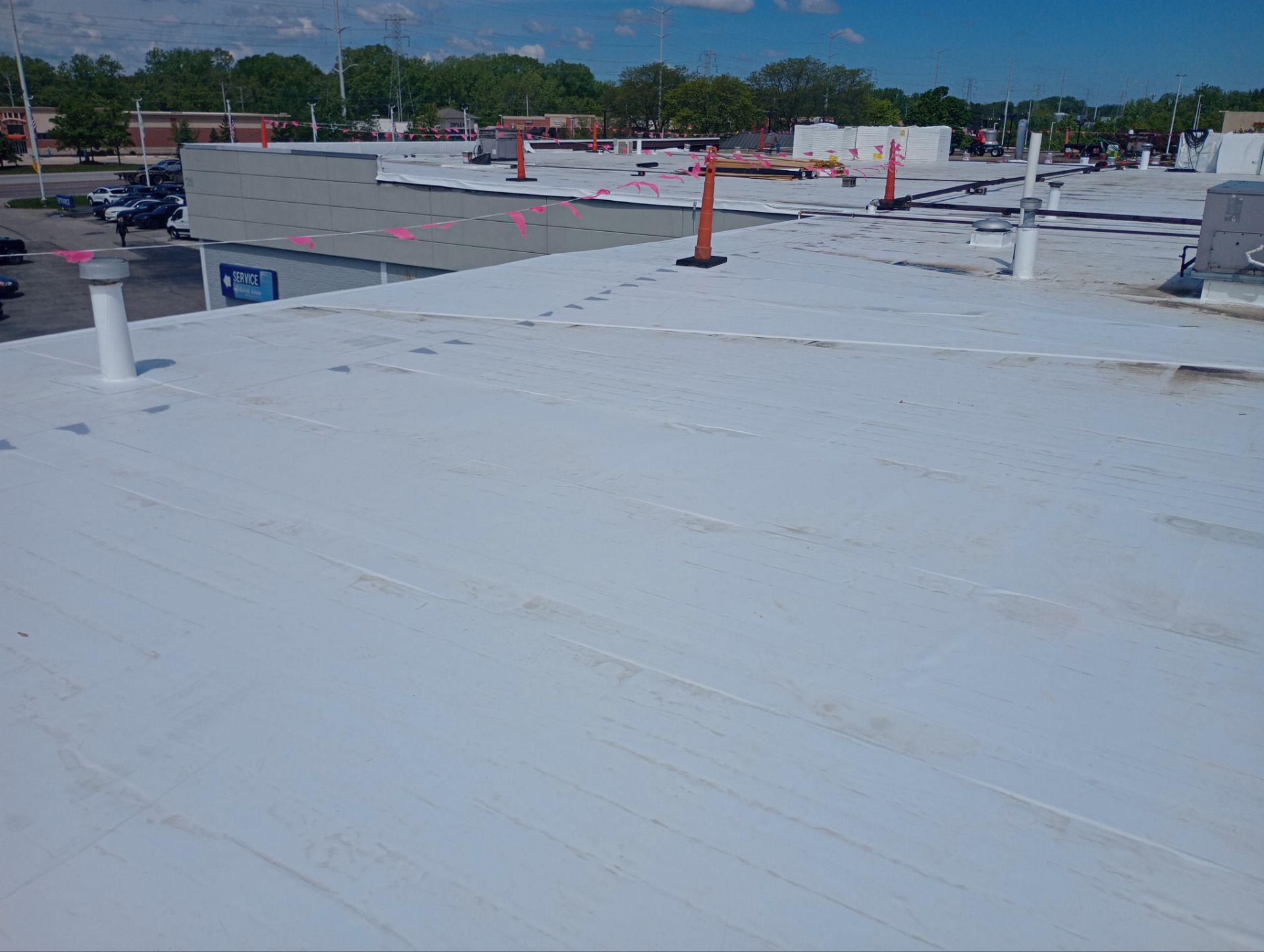 Ford Dealership - Re-Roof by Pink Roofing