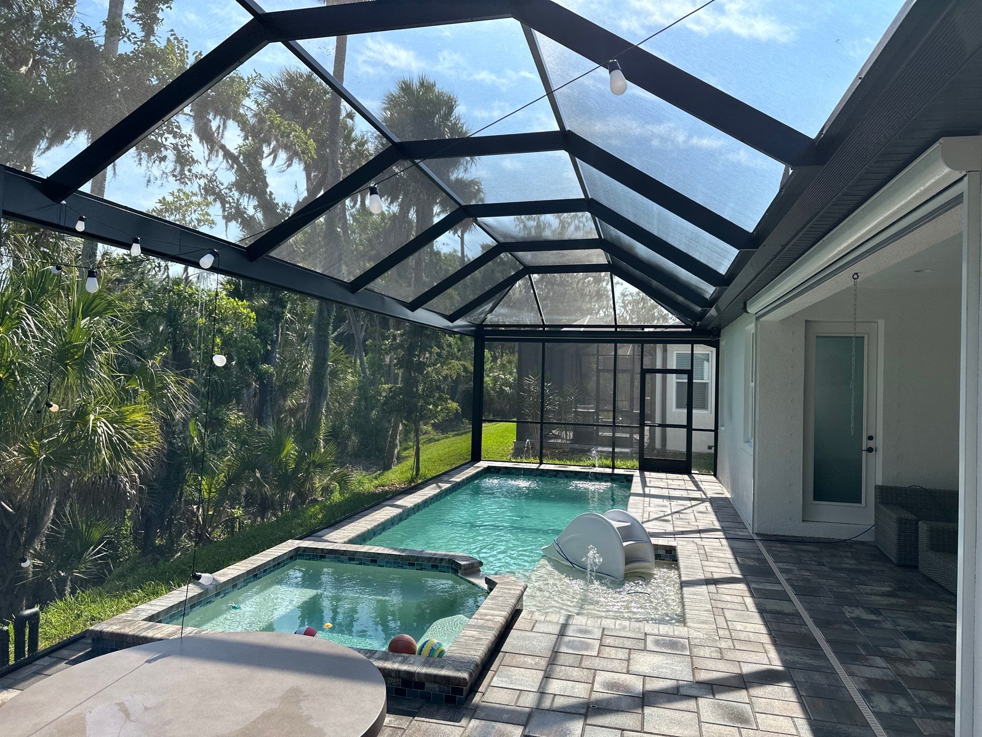 Screen Enclosure & Paver Pool Deck Cleaning in Trevesta Community, Palmetto, FL | Sunshine AquaWash by Sunshine AquaWash