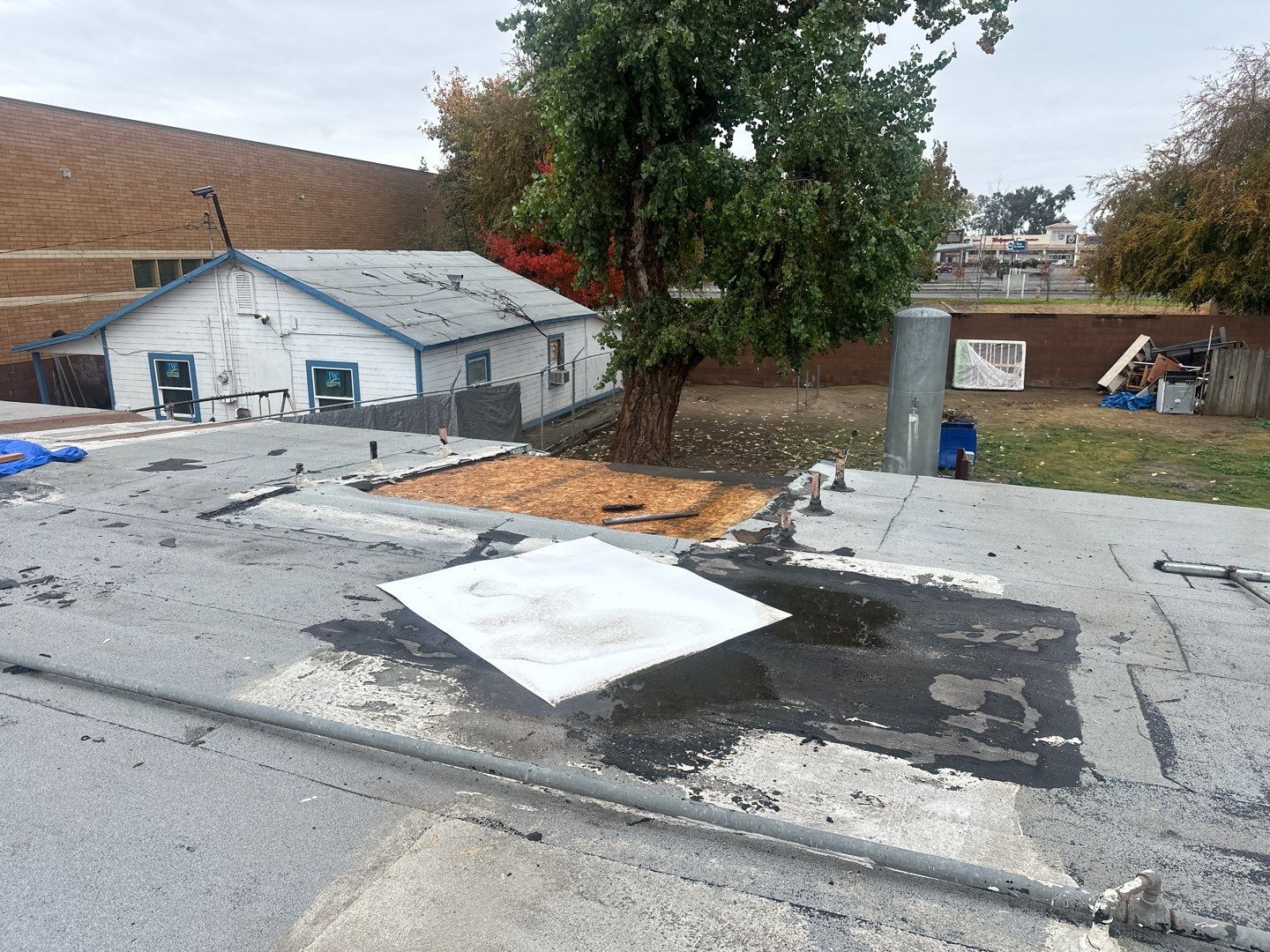 Emergency Roof Tarp Service - Fresno, CA by Grandmark Service Company