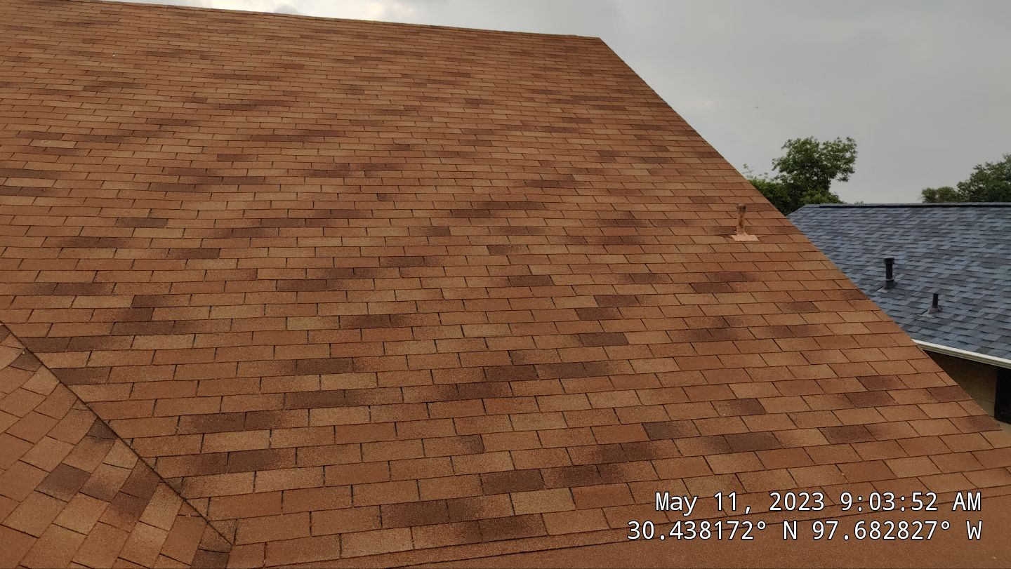 New Roof Installation Of IKO Dynasty Color Brownstone by DeZign Roofing & Exteriors