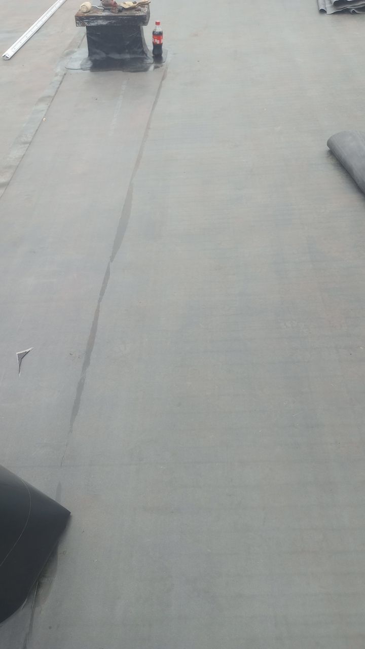 Commercial Roofing Installation using Performance Shingles by Mr. Roofer