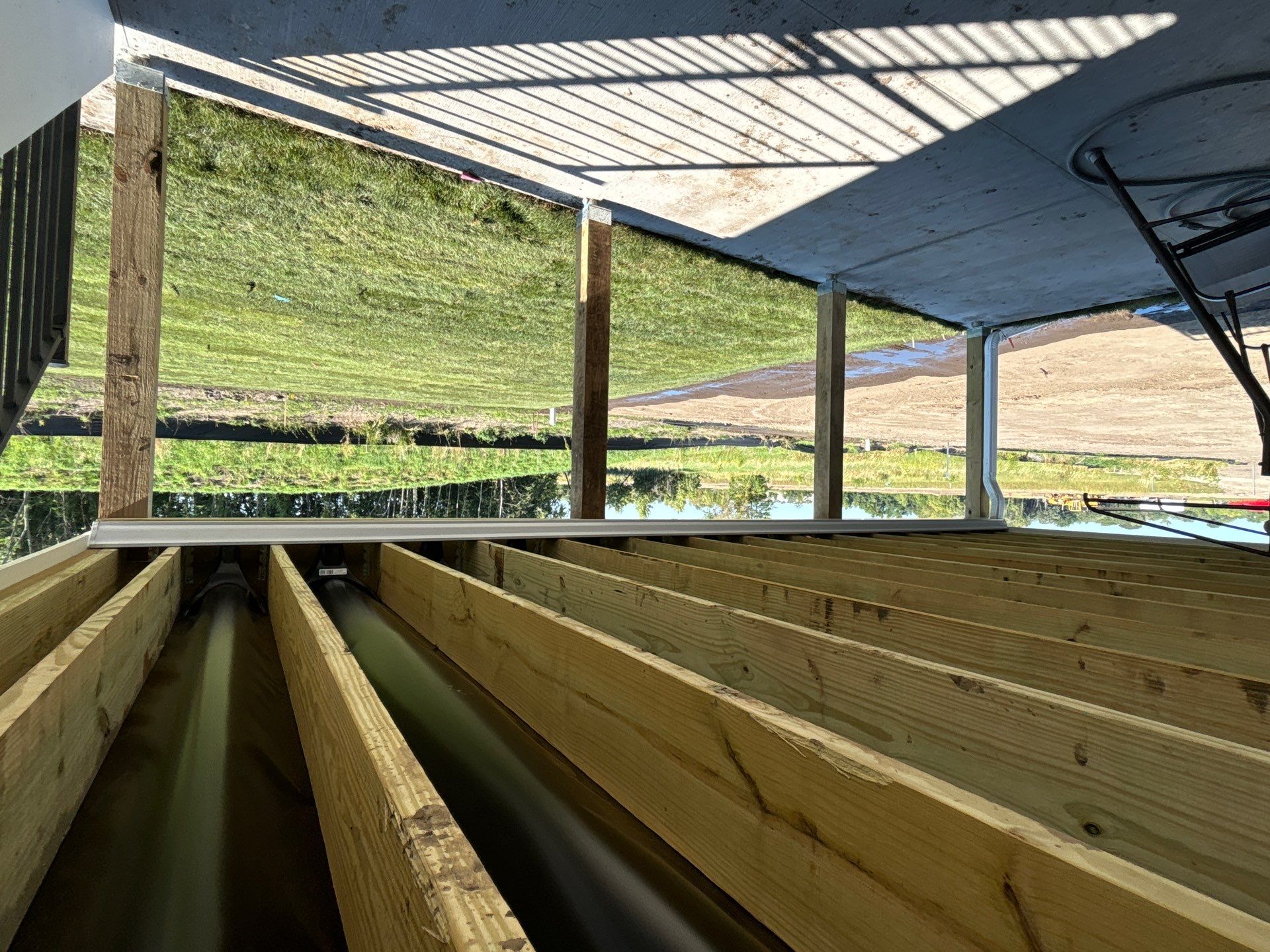 Under Deck Gutter System Installed by Next Level Seamless Gutters / Exteriors Inc.
