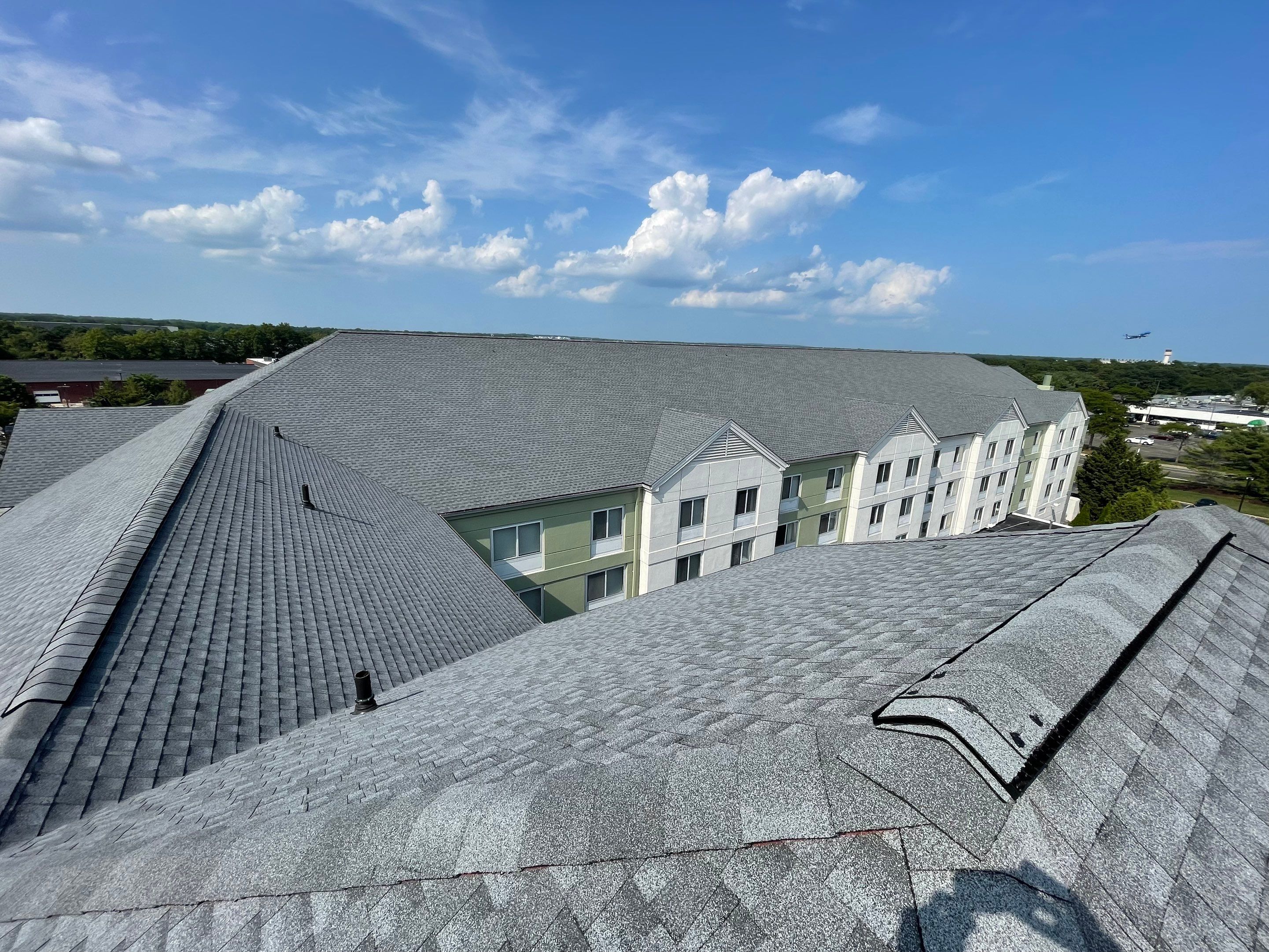 Commercial Roofing Installation using GAF Timberline / New Gutters and Downspouts by All Site Roofing