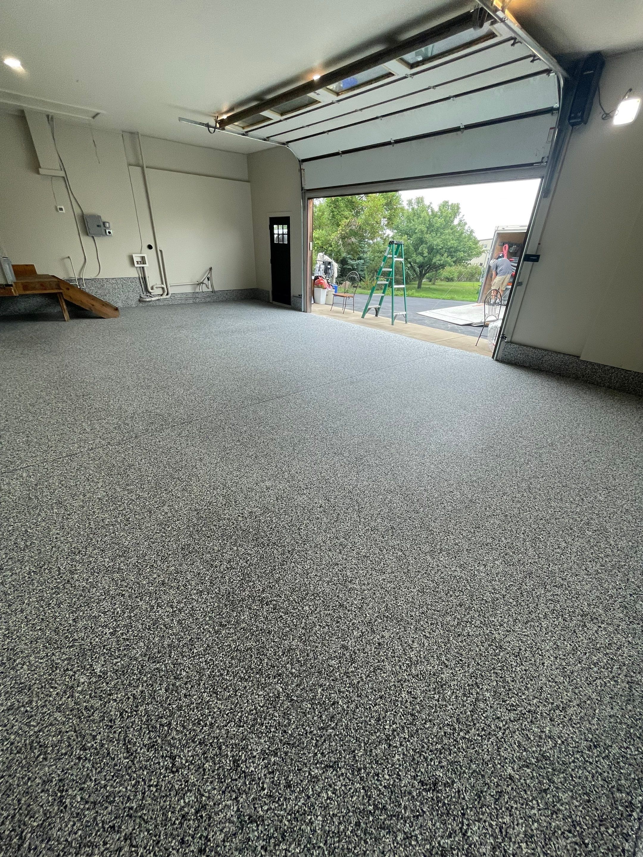 Domino Flake Floor Coating and Crack Repair in Chancellor by Select Painting, Coatings & Garage Cabinets