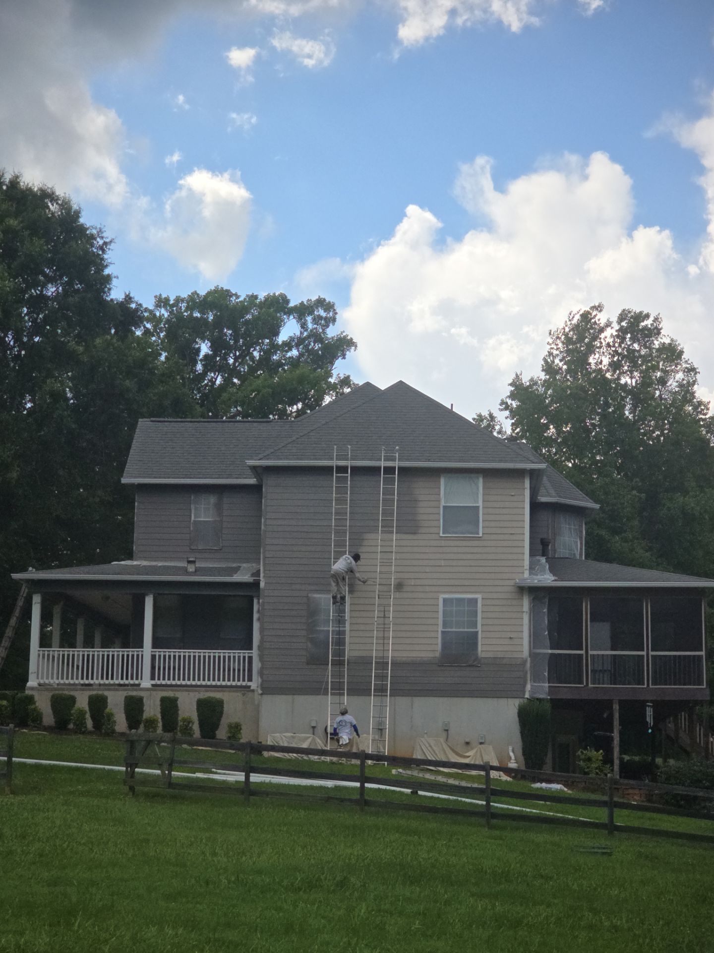 Siding replacement, exterior painting, and front door staining. by GonzalezPainters & Contractors Inc