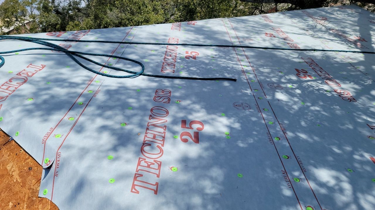 Residential Roofing Installation using Roof Replacement by American Roofing & Construction LLC