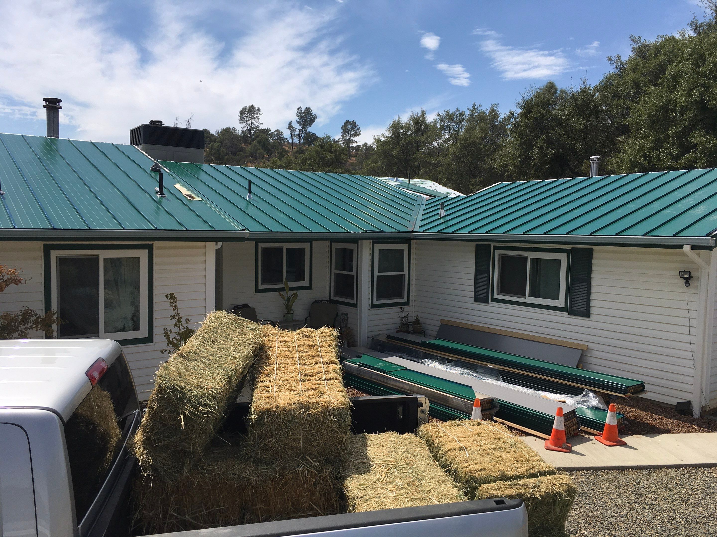 Metal roofing installation using Standing seam metal roofing system by Straight Edge Roofing Inc