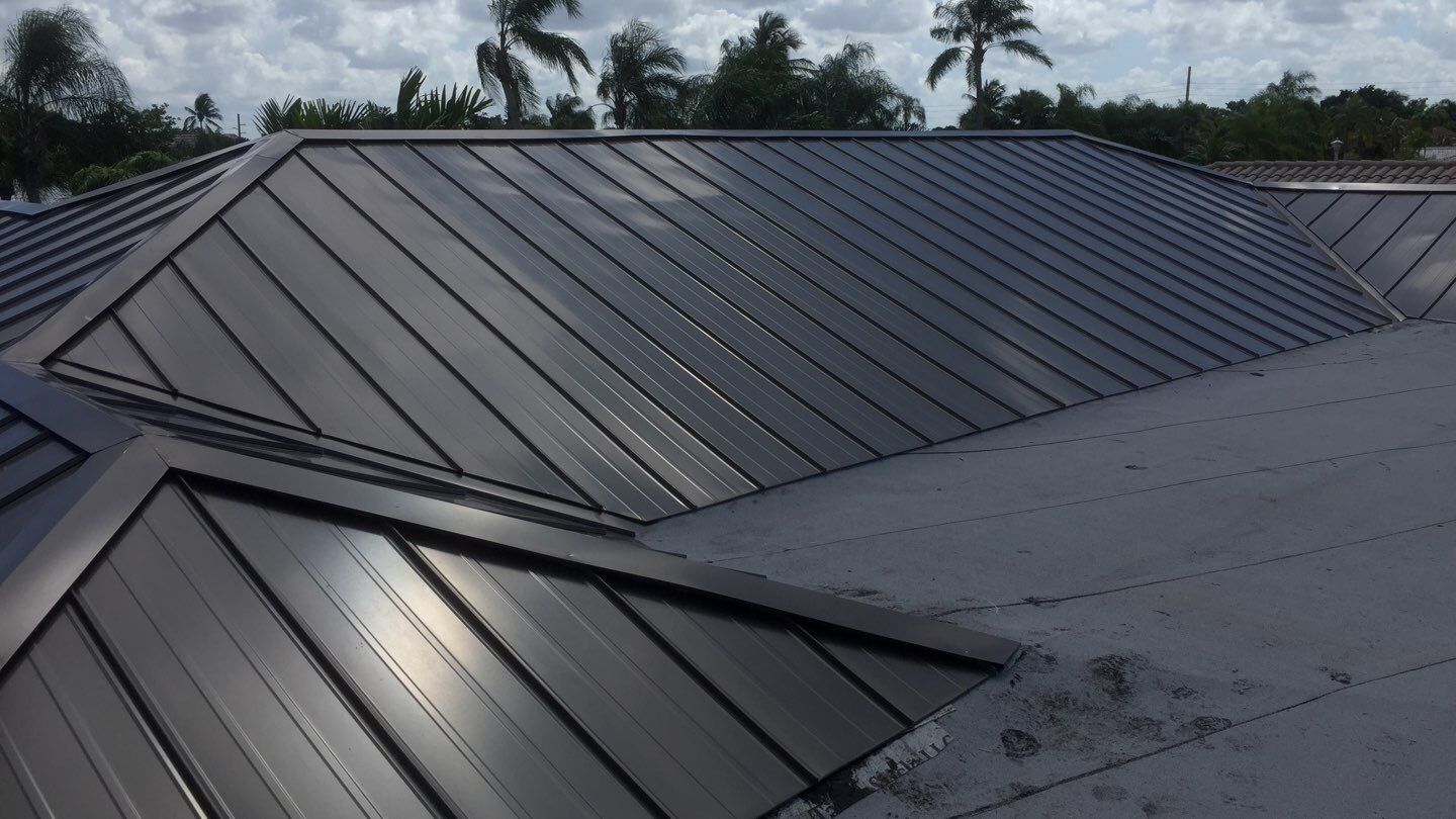 Residential Roofing Installation using 1" Nail strip metal roof by BLUES BROTHERS ROOFING