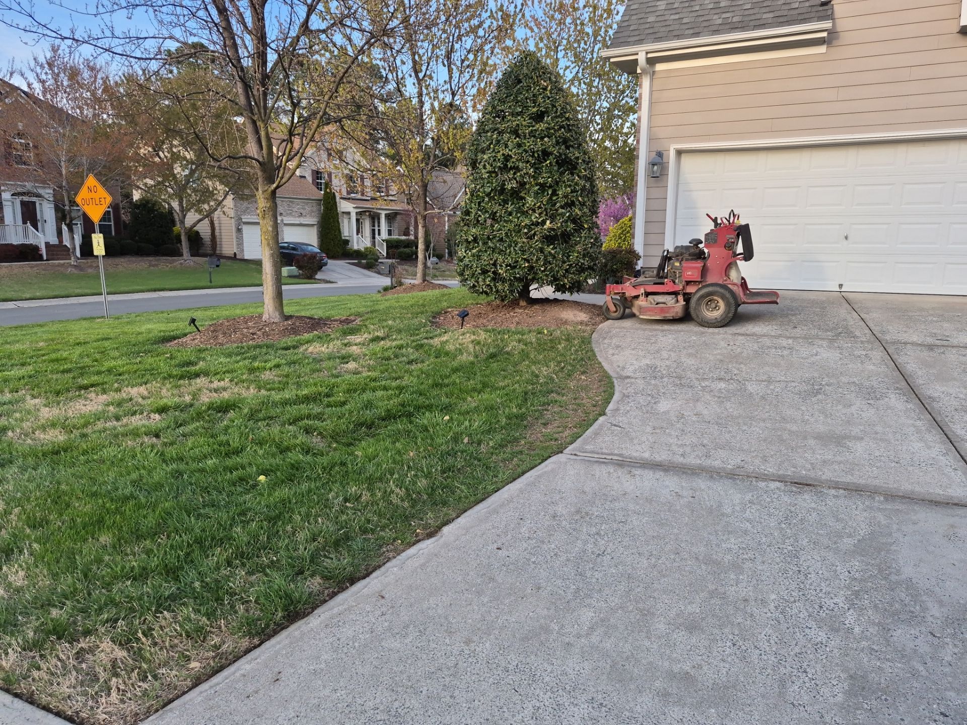 Fixing brown spots in grass in Durham by Martinez Brother’s Nc Landscaping Inc