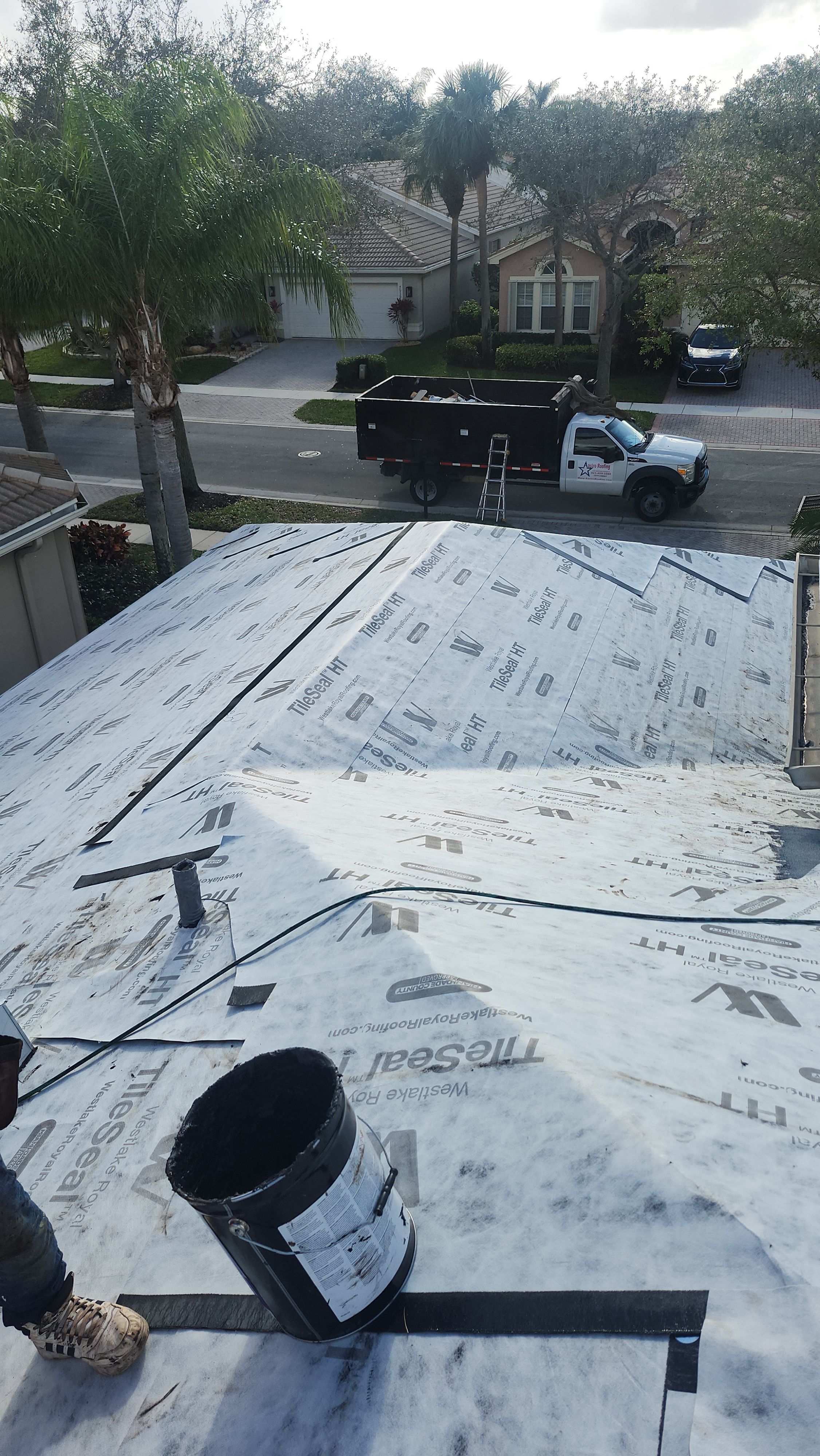 Full Concrete S-Tile Roof Replacement and Deck Repair in Wellington by Aastro Roofing