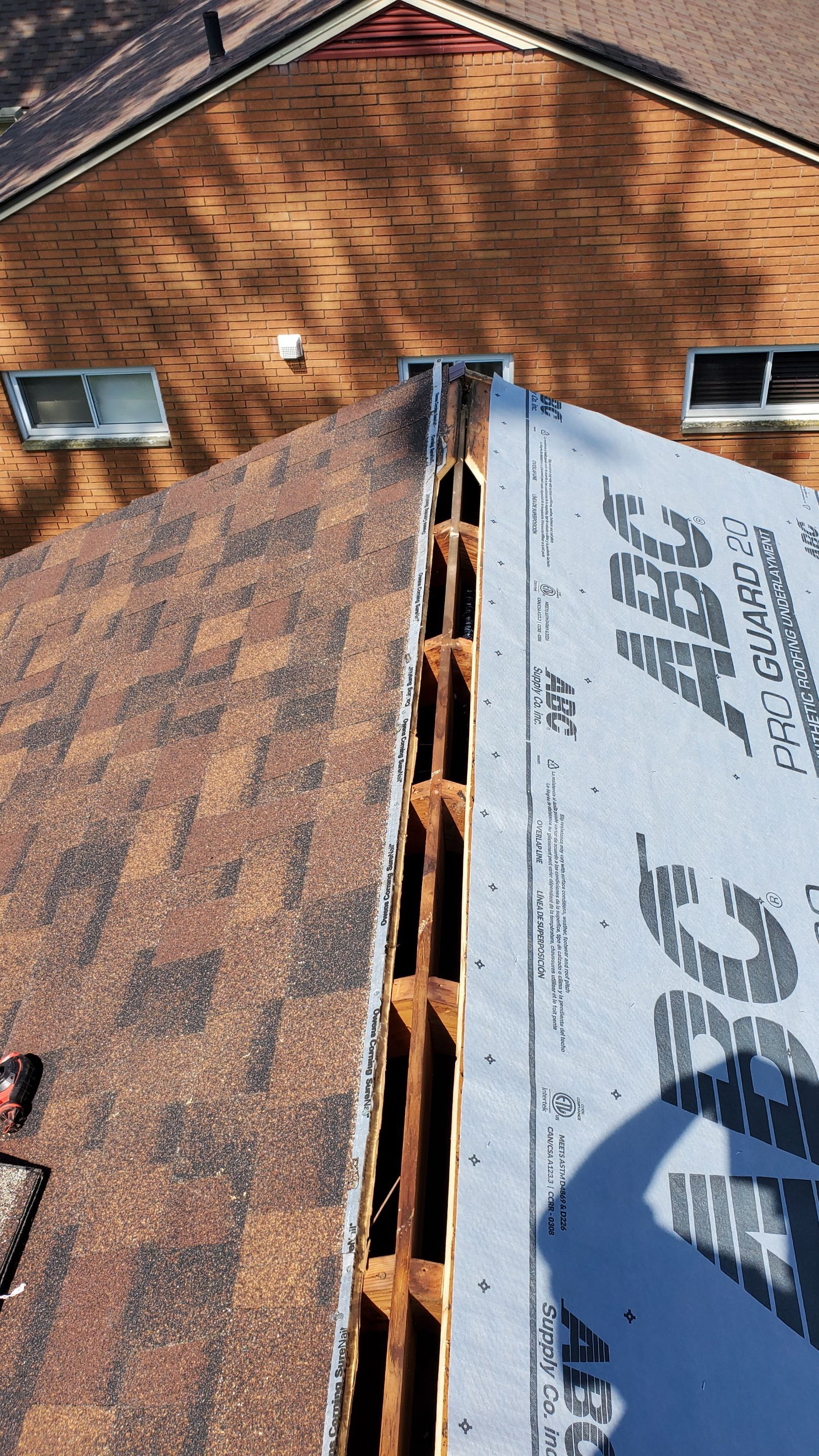 Residential Roofing Installation using Ownens Corning Duration Brownwood by Absolute Roofing and Construction
