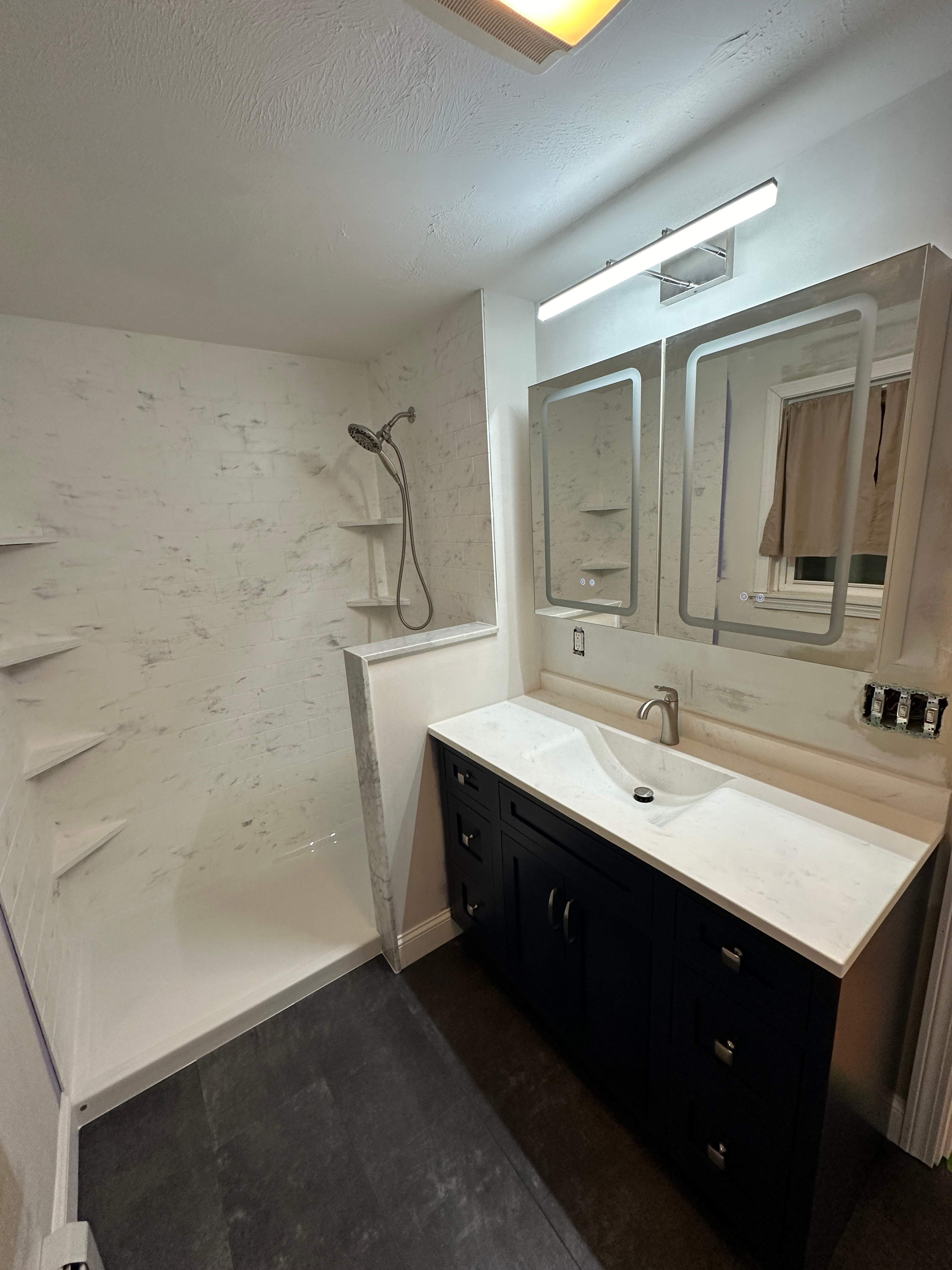 Solid Surface shower by Renovatic LLC