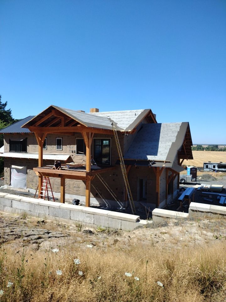 Residential Metal Roof Installation using Taylor Metal Snap Lock Metal Color: Black by Orezona Building & Roofing Company, Inc.