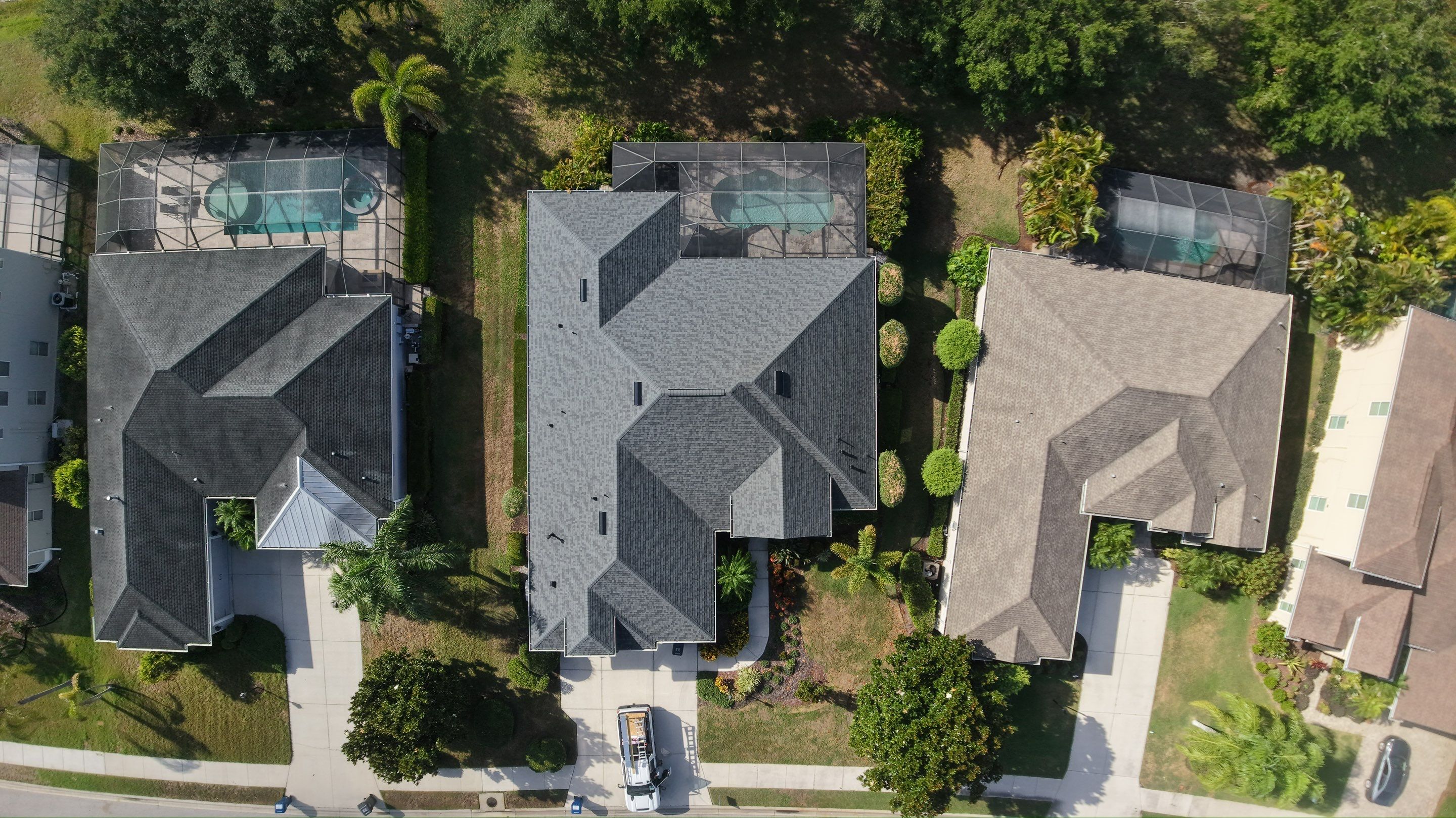 Residential Roof Installation With Estate Grey Architectural Shingles in Bradenton by Trinity Restoration and Roofing LLC