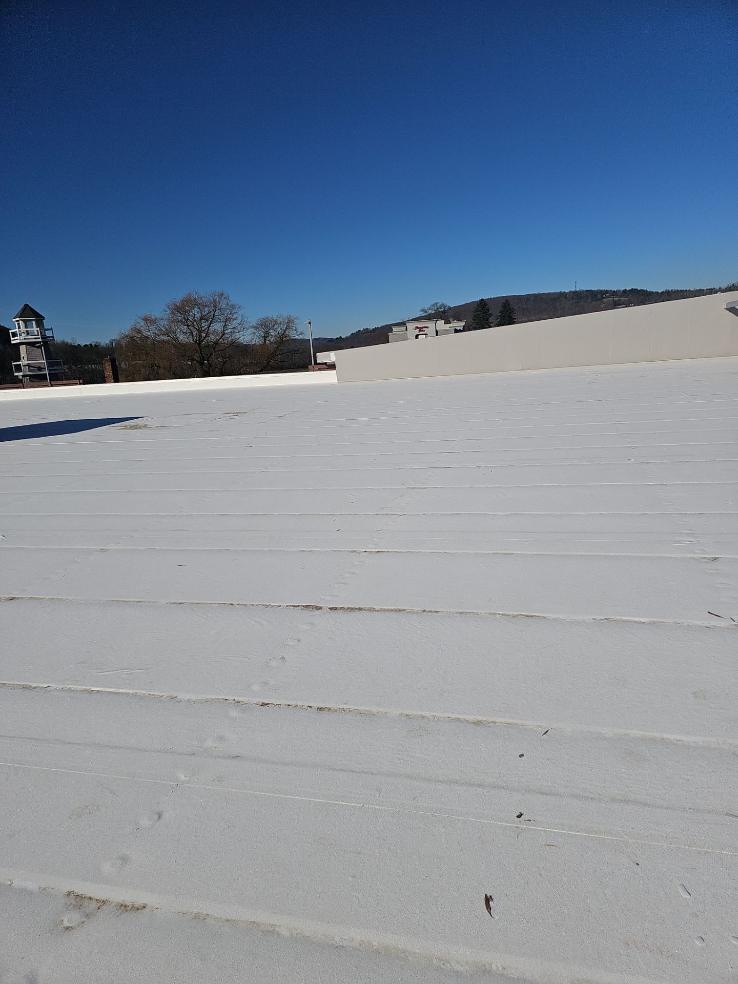 Commercial Roofing Installation using Insulated roof and wall panels by Nitro Roofing and Construction