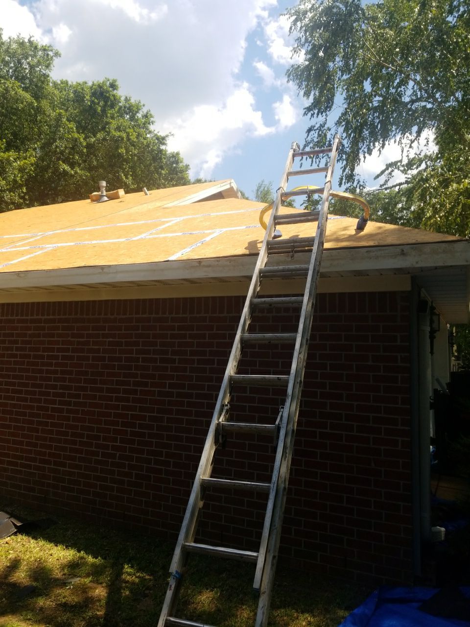 Residential Roofing Installation using Roof Replacement by American Roofing & Construction LLC