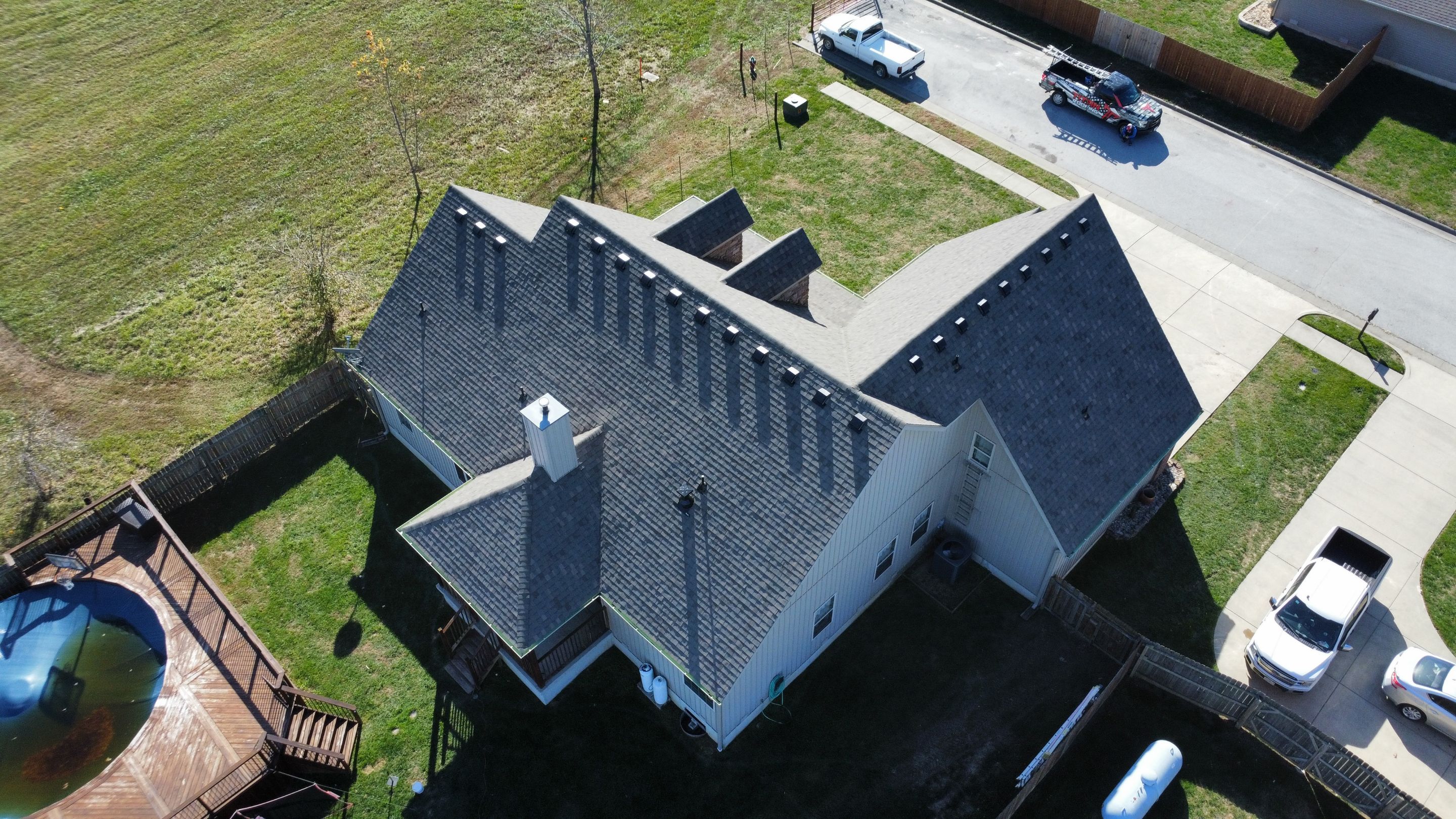 Residential Roof + Gutters & Downspouts Install  by Titan Commercial & Residential Roofing 