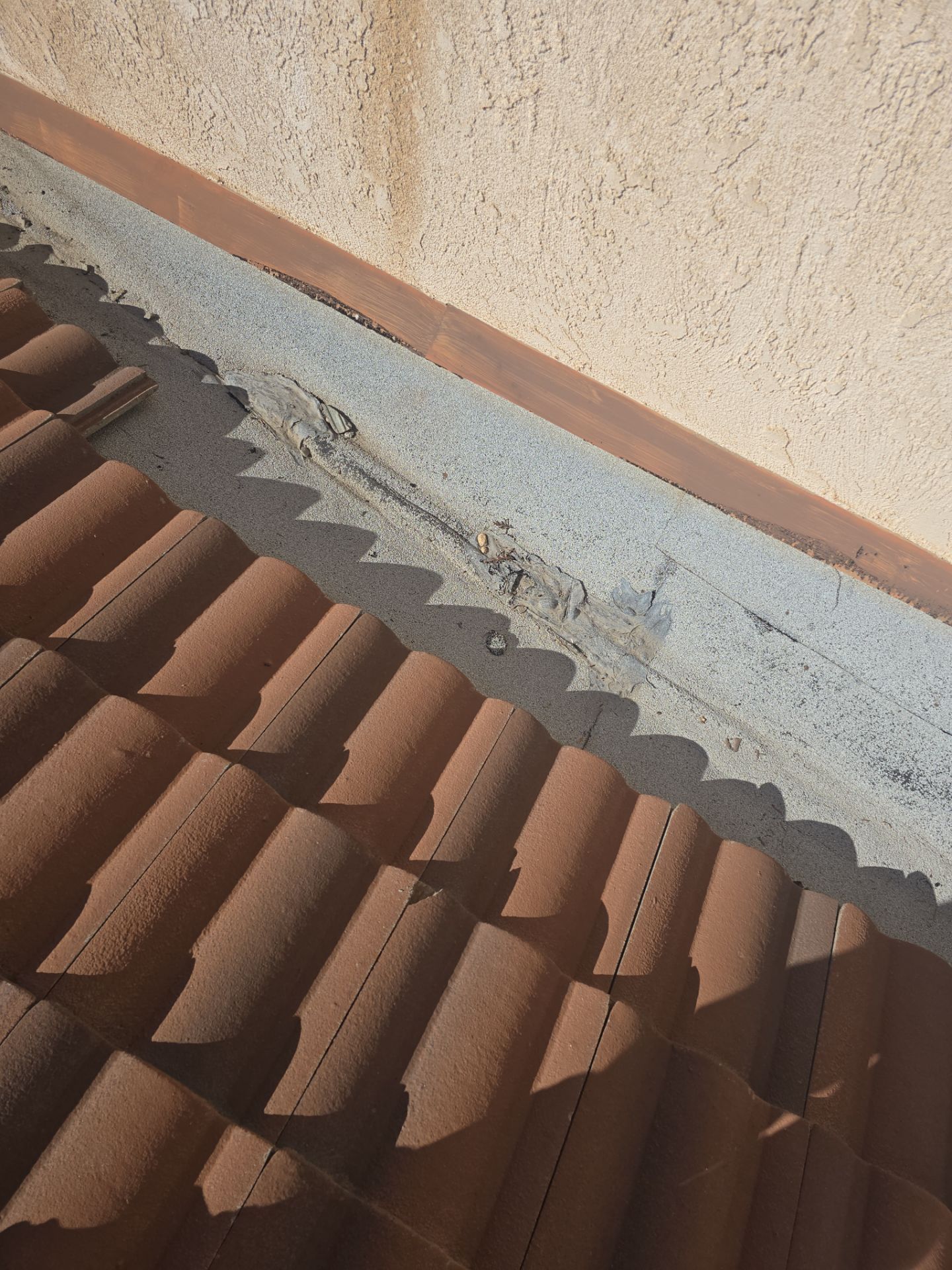 Tile Roof repair by Grandmark Service Company
