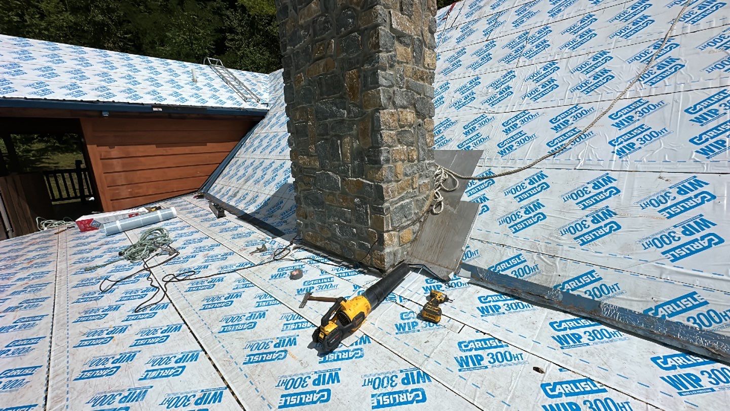 Residential Roofing Installation using Standing Seam Metal - Gallery Blue by RoofX 