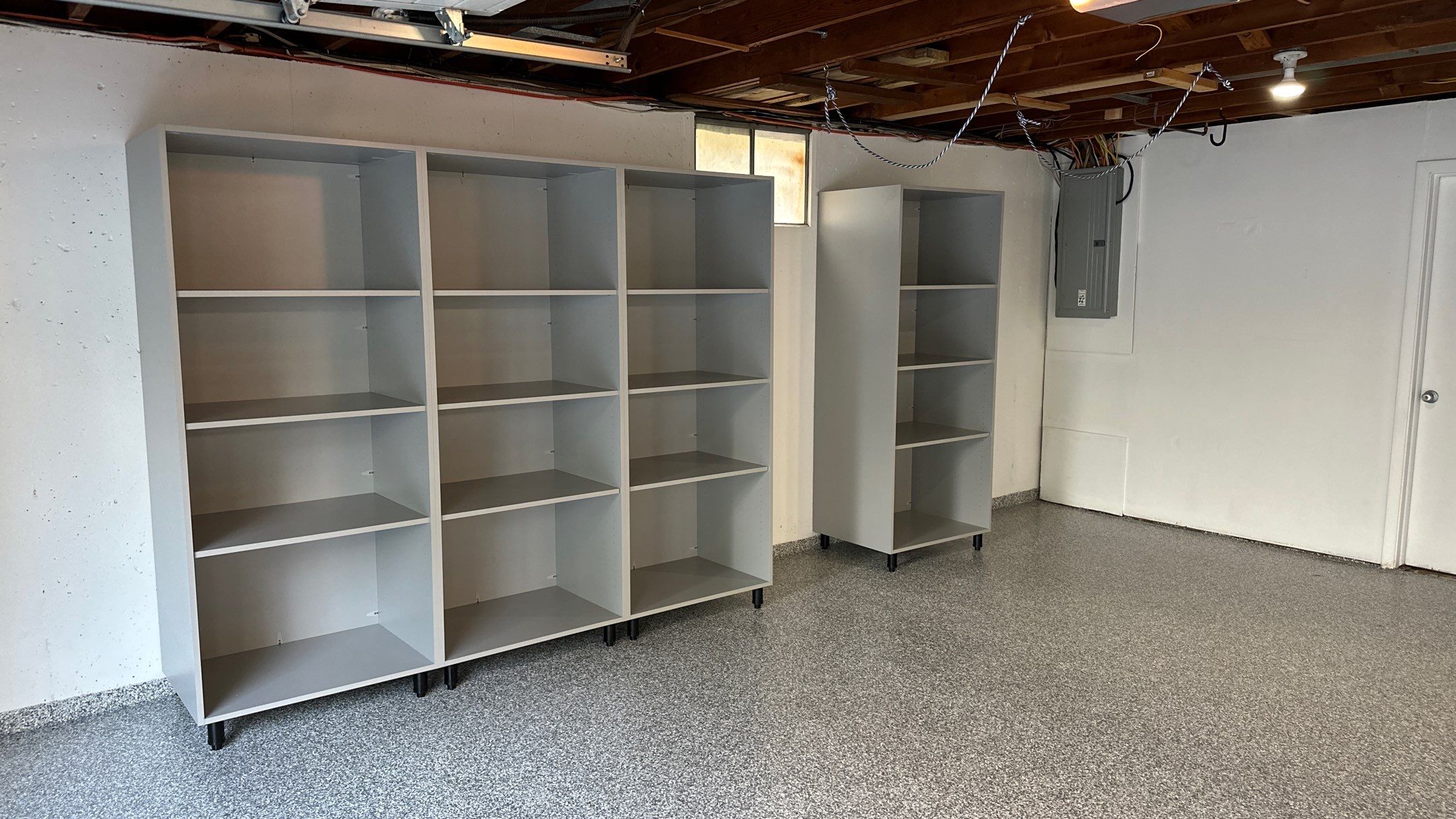 Vernon T. new garage floor and storage looks great!! by Banner Garage