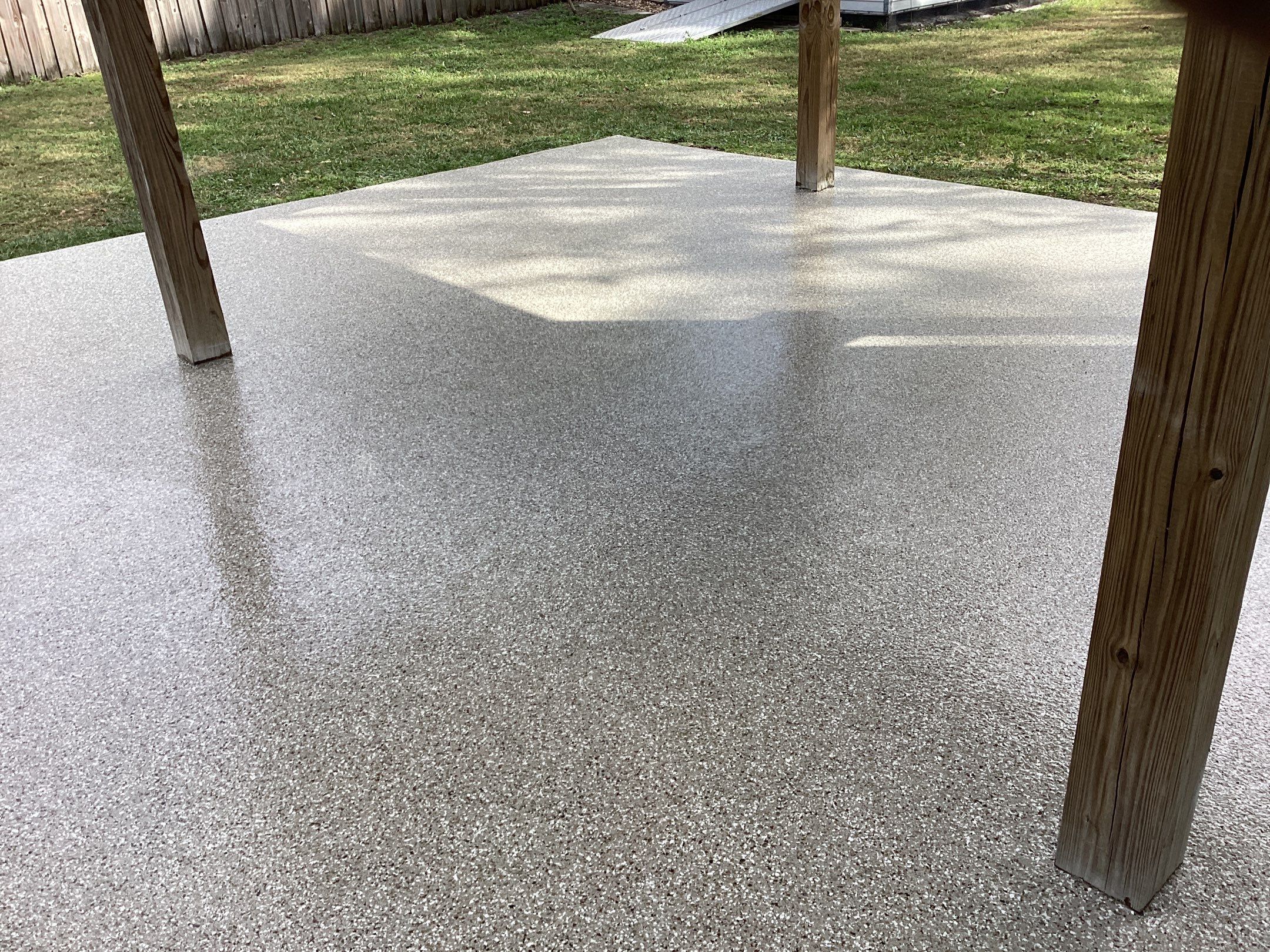Patio using Pebble Beach by Amvet concrete coatings llc