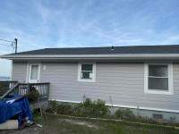 Siding Installation using JH Select Cedarmill Eased Edge by ExteriorPros