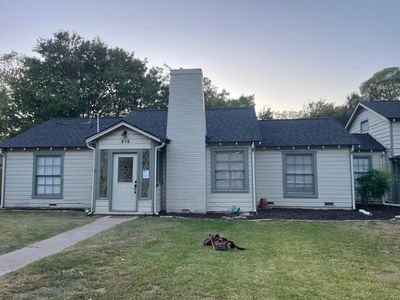 White exterior with IKO Glacier