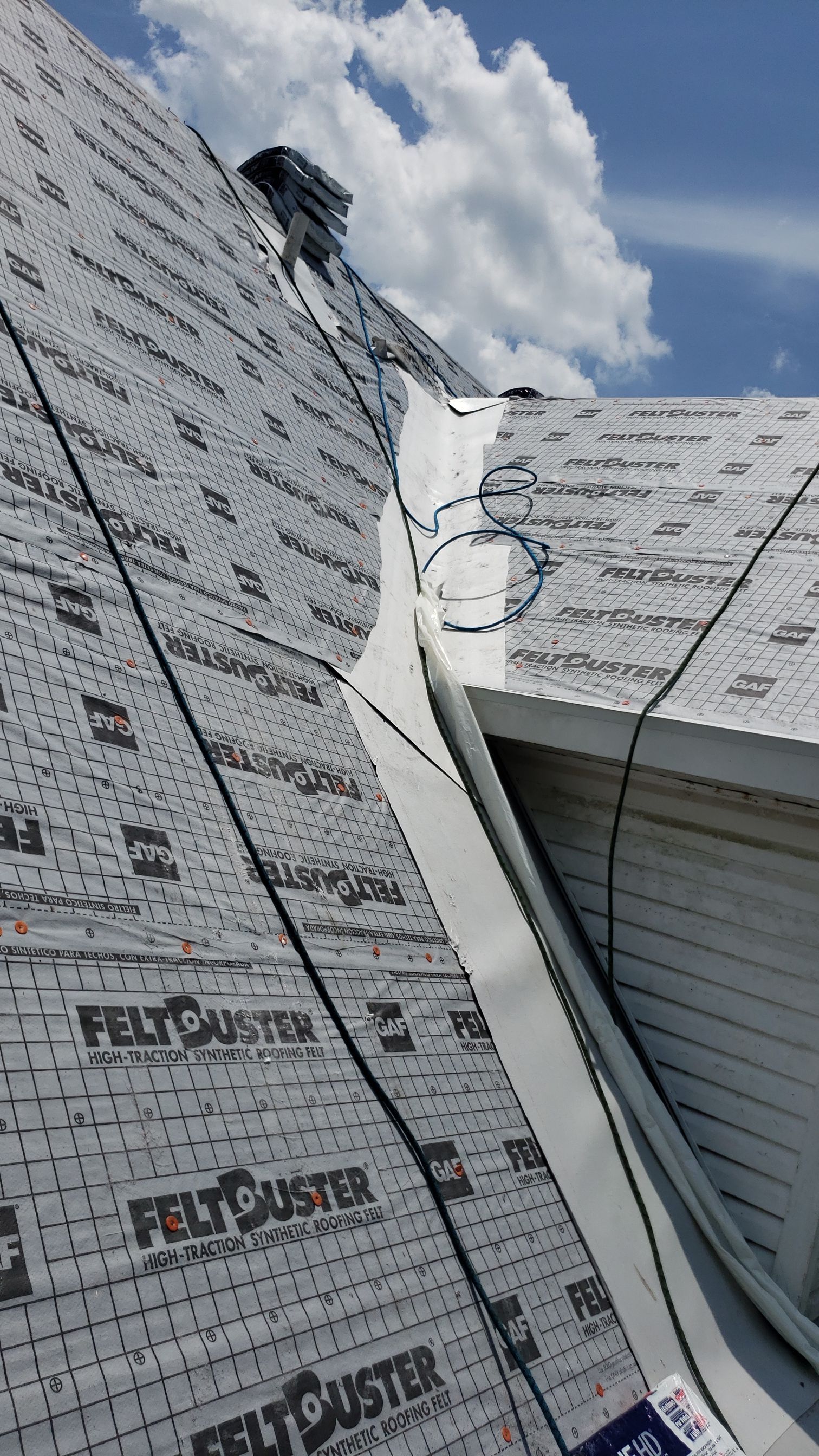 Residential Roofing Installation using Roof Replacement by American Roofing & Construction LLC