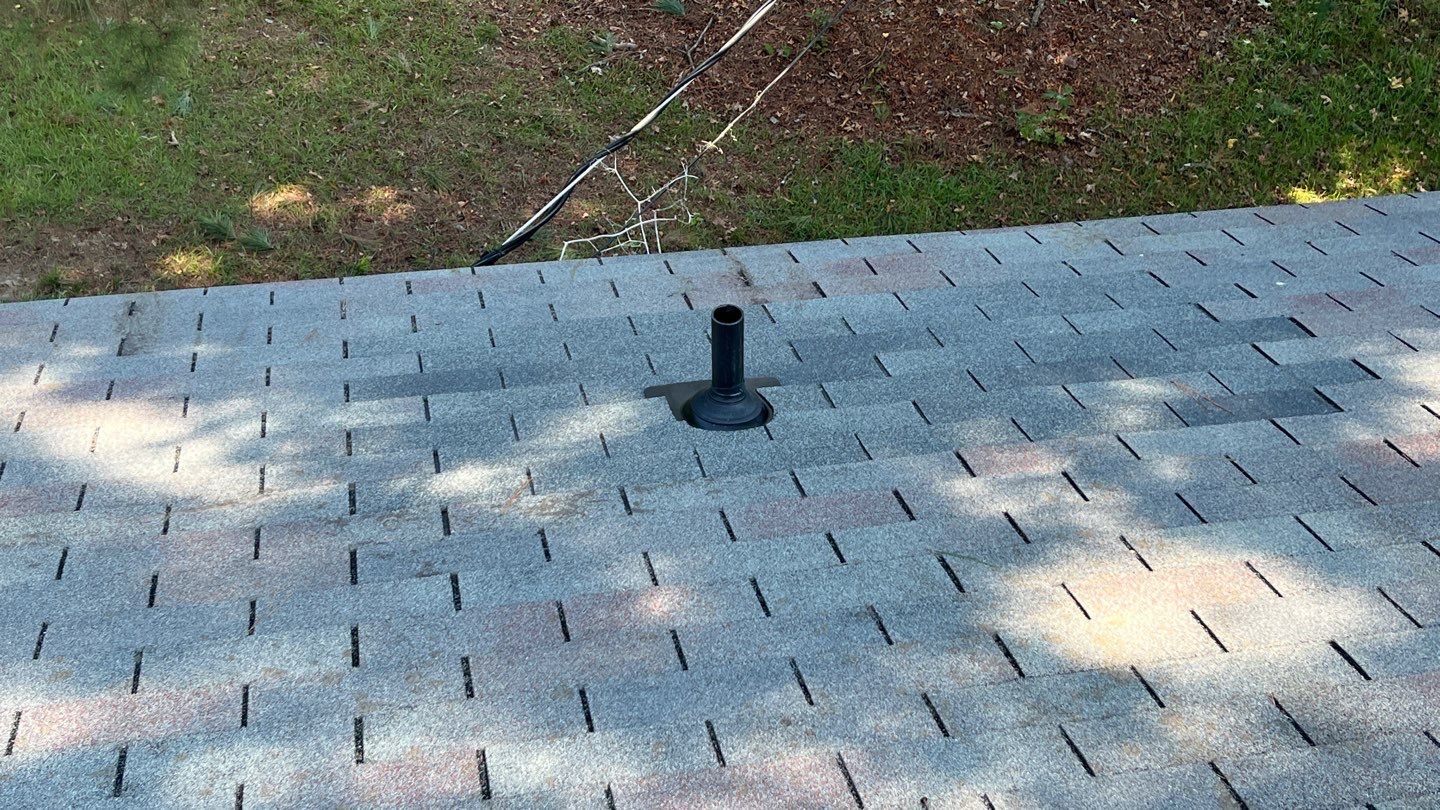 Chimney and Pipe Boot Flashing Roof Repair by Midlands Roofing & Exteriors