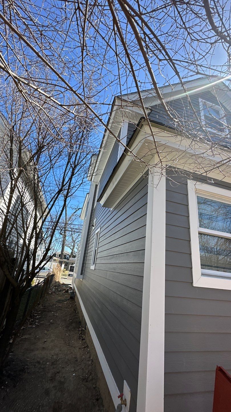 Siding Installation using Hardie Plank Aged Pewter by A Plus Exterior