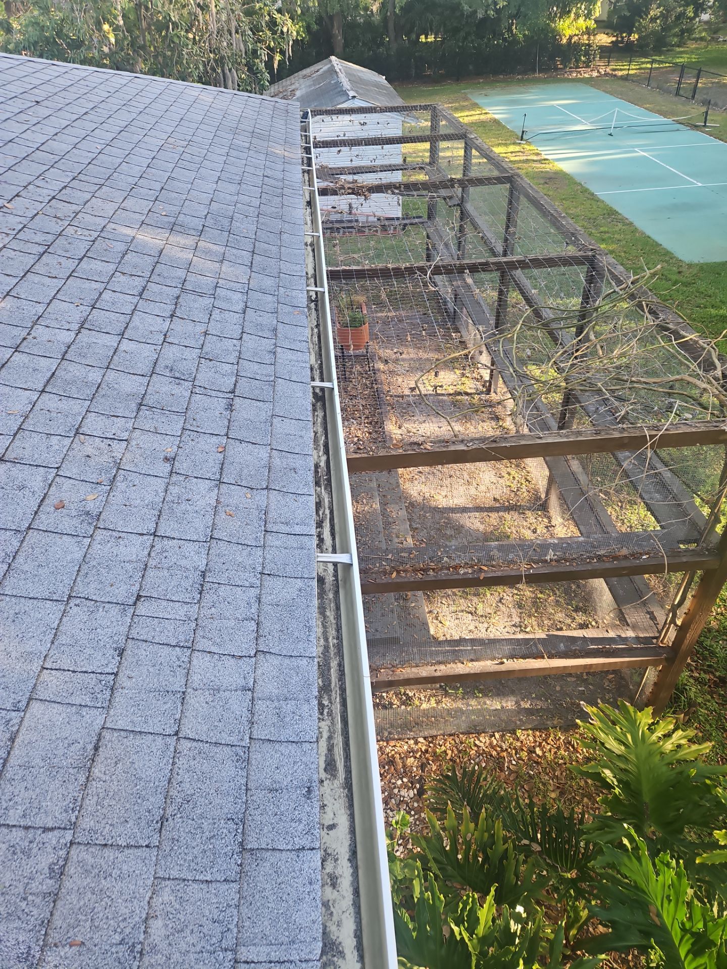 Cleaning Gutters in Sarasota FL by Gutter Professors