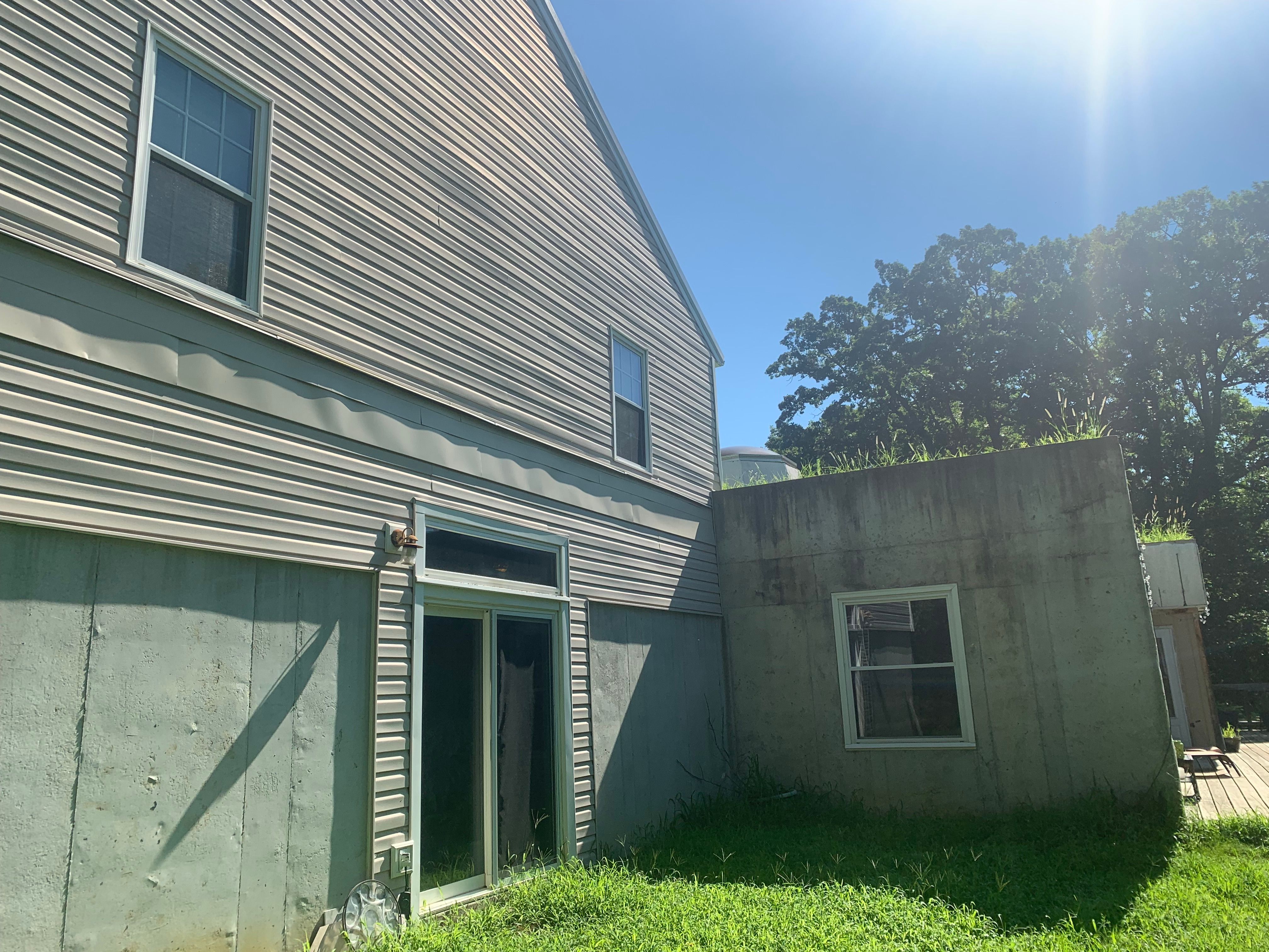 Contemporary house Siding Installation using Mastic Premium Vinyl siding  by EEC  Windows, Siding & Roofing 