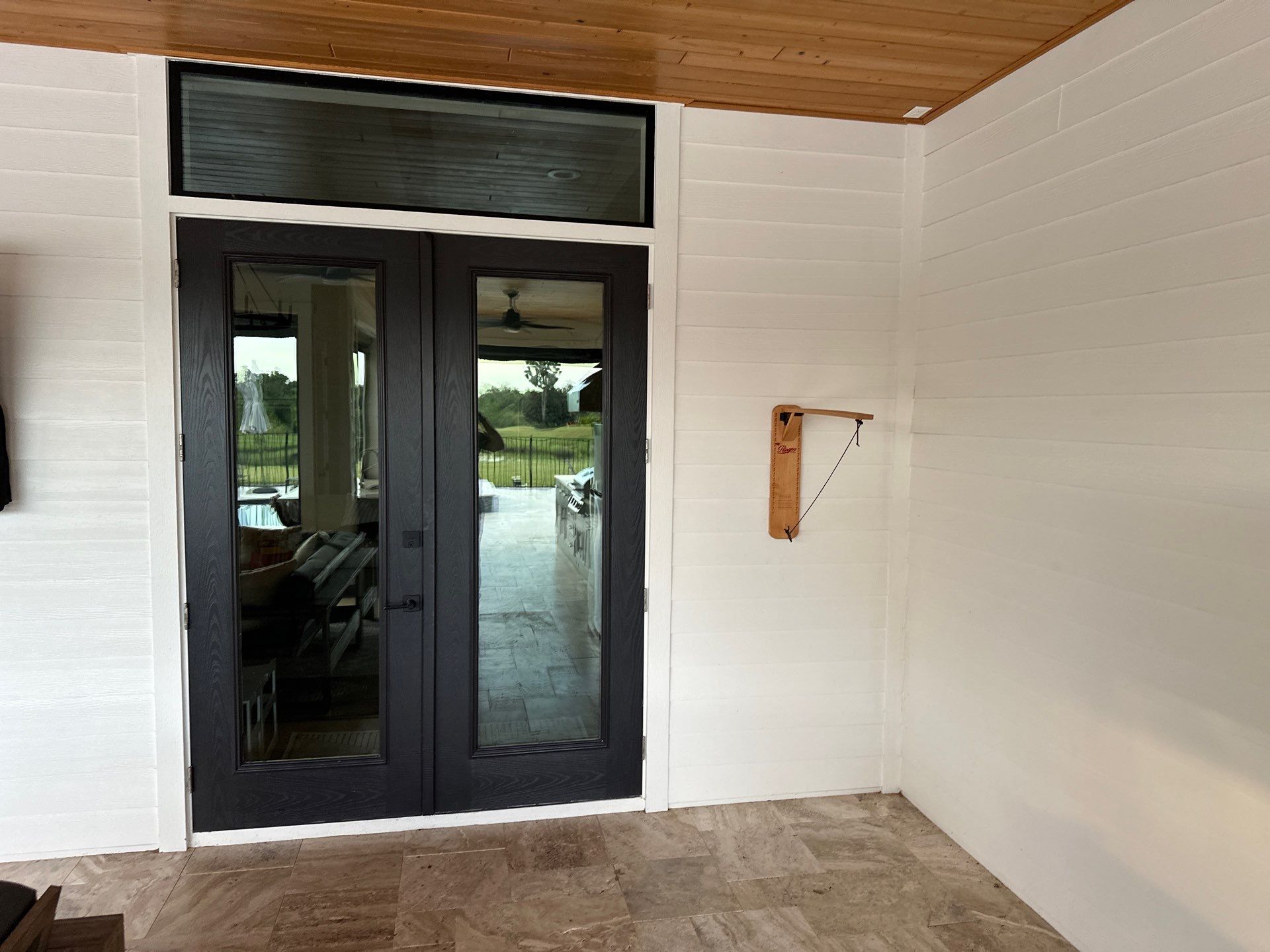 Complete Two-Story House Wash and Driveway Cleaning in Winding River Community, Bradenton, FL by Sunshine AquaWash