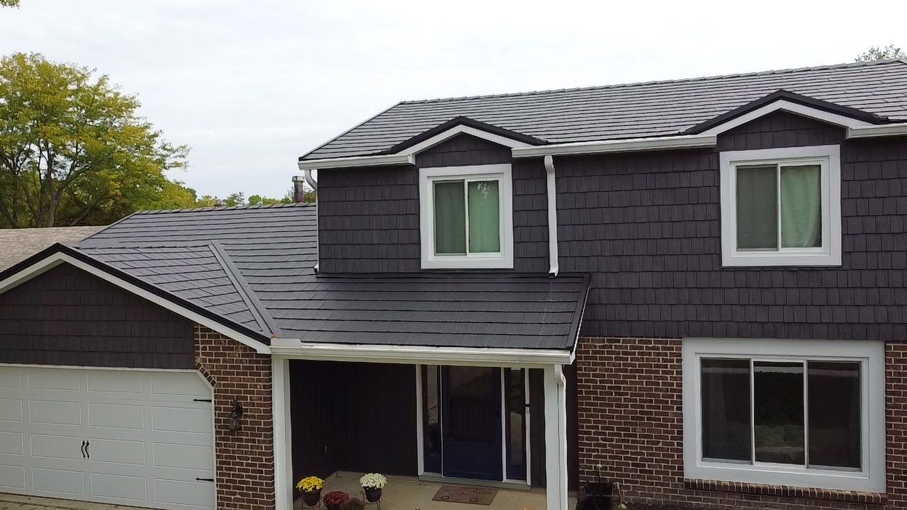Full Exterior Home Transformation – Metal Slate Roof in Fort Wayne, IN by 4Ever Metal Roofing