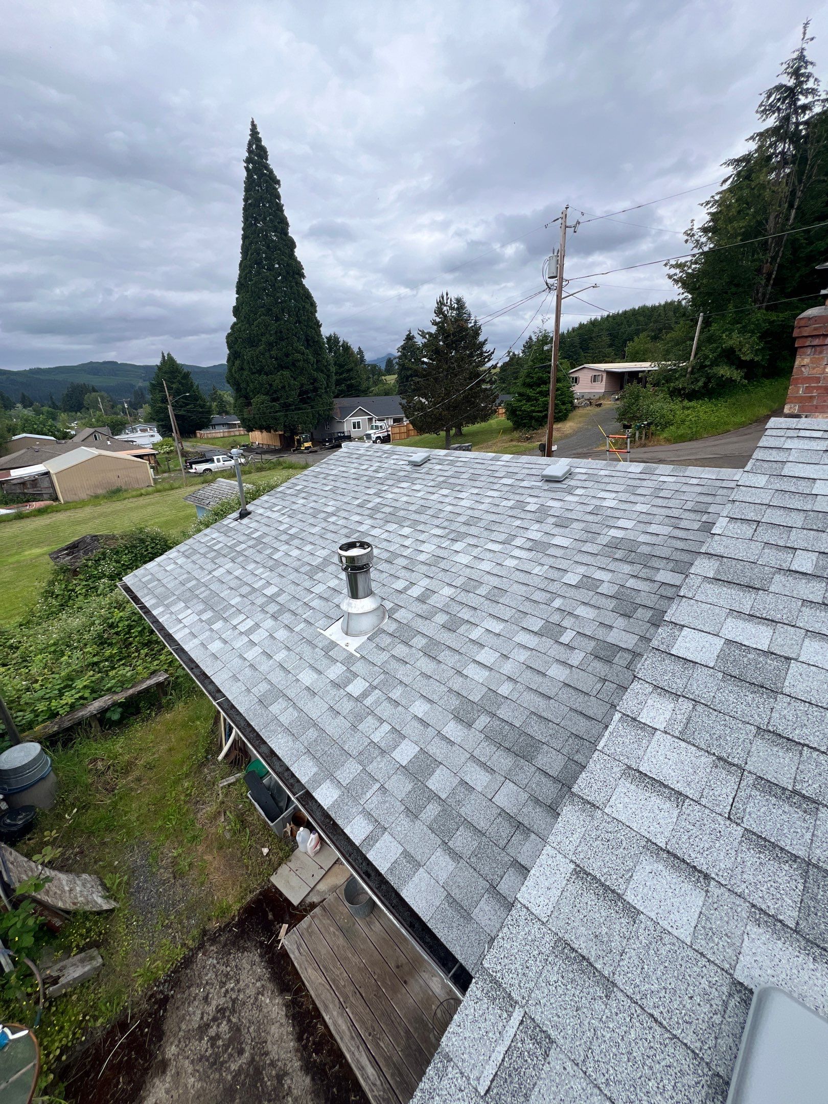 Residential Roofing Installation using IKO Dynasty (Color: Frostone Grey) by Orezona Building & Roofing Company, Inc.