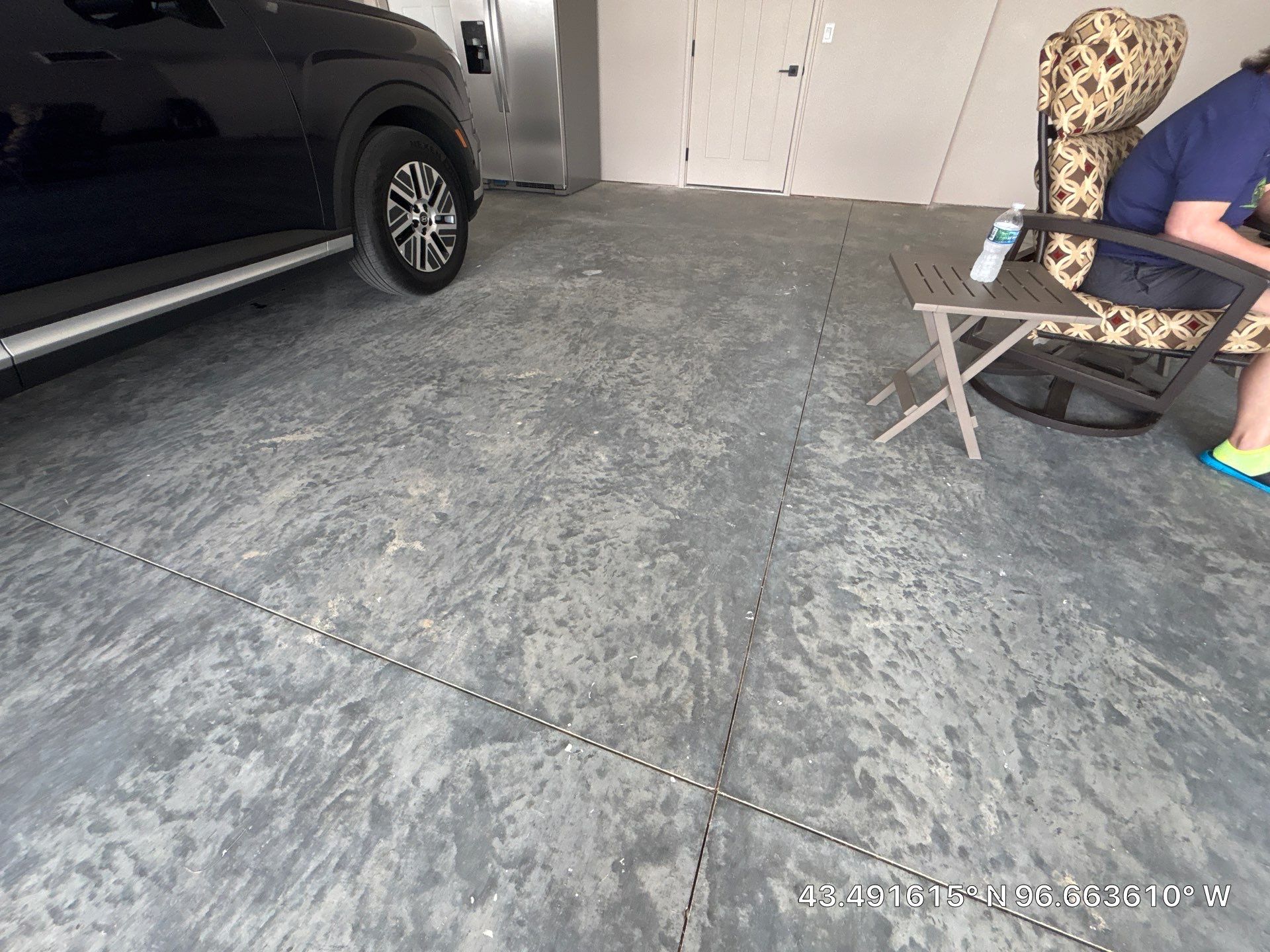 Full Speckled Concrete Coating for Sioux Falls Garage by Select Painting, Coatings & Garage Cabinets
